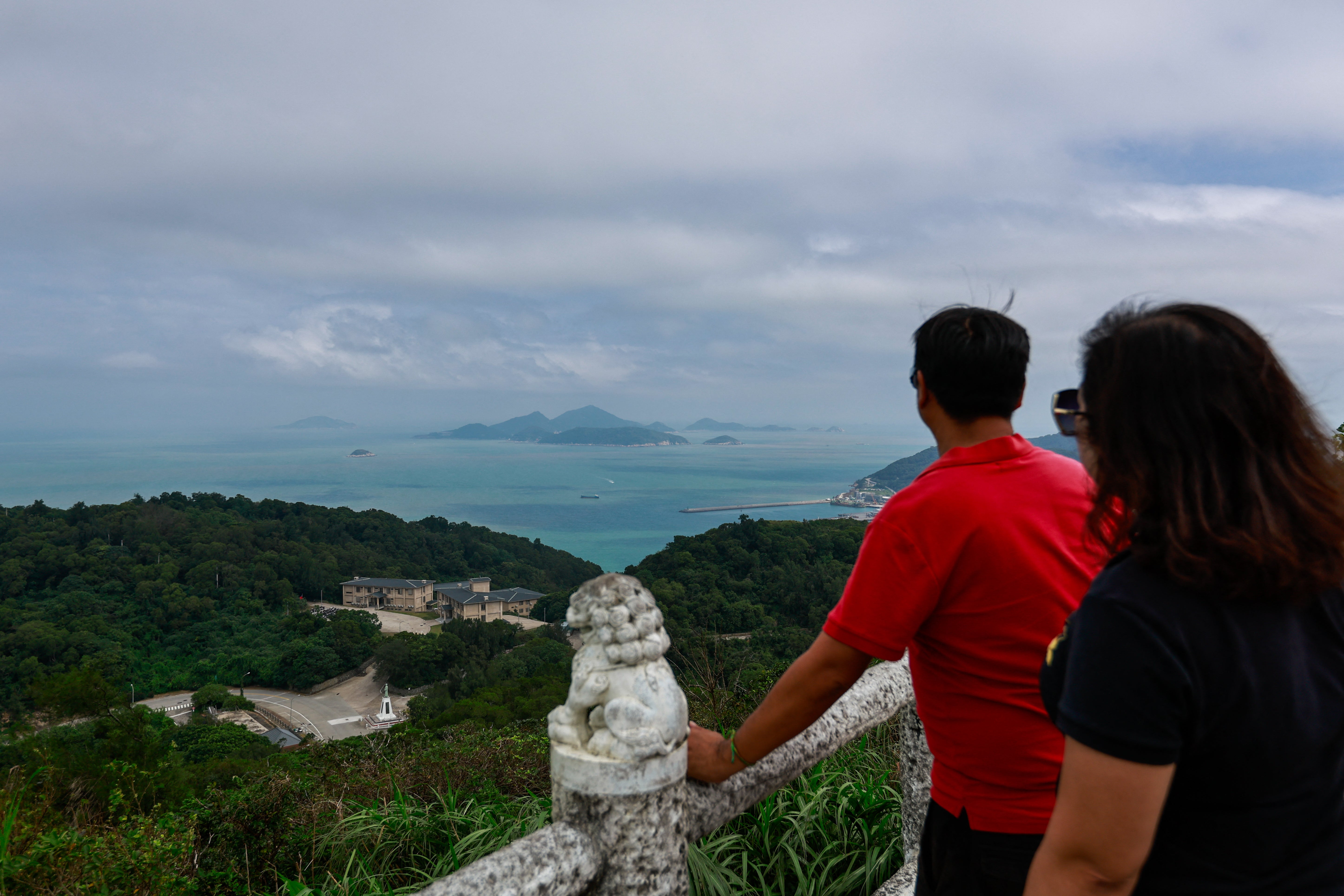 People look at the view from an observation point in Nangan township in the Matsu Islands
