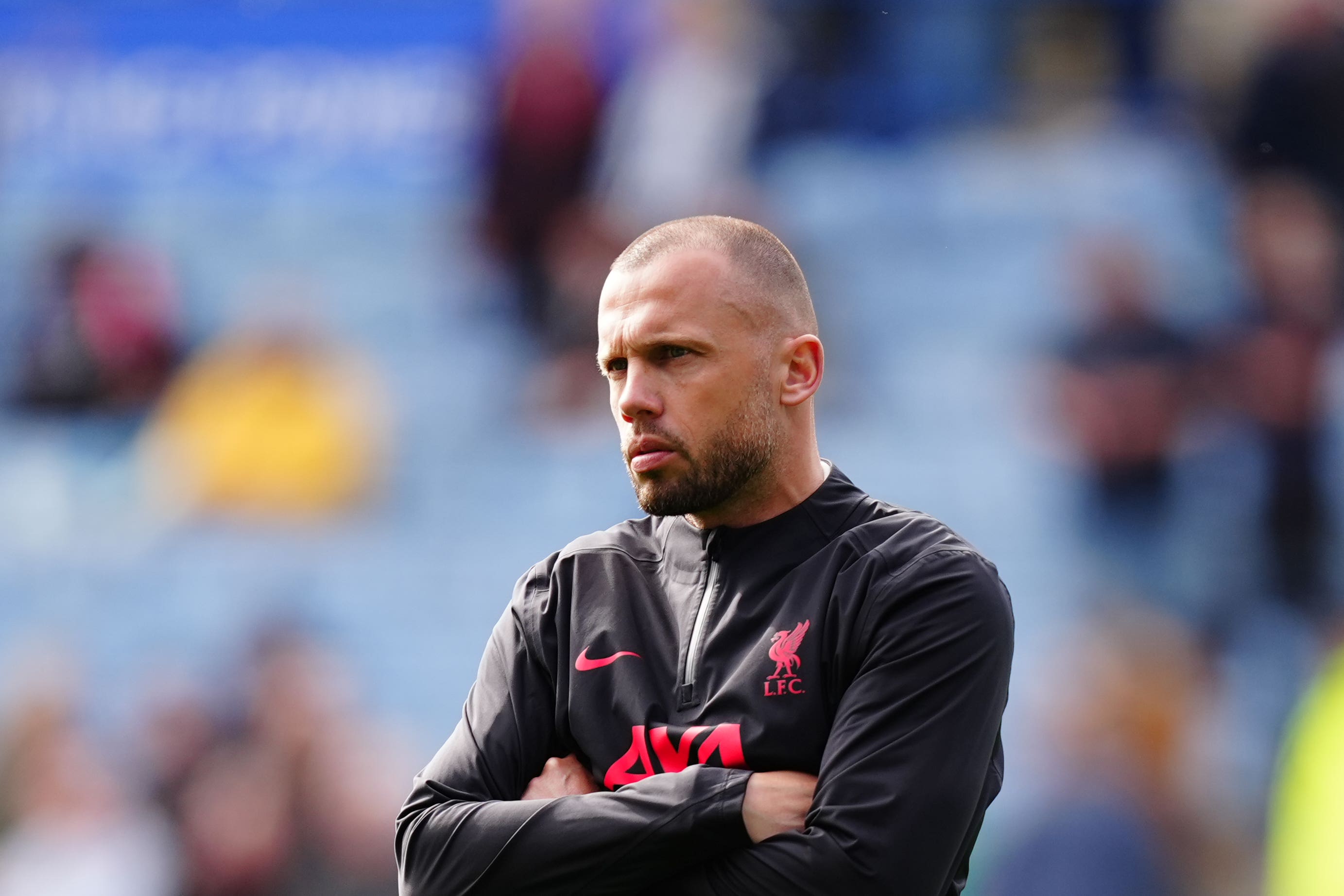 Liverpool assistant coach John Heitinga is a contender for the Ajax job (Mike Egerton/PA)