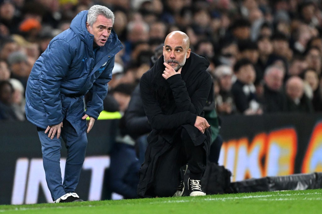 Pep Guardiola with his Manchester City assistant Juanma Lillo at the Tottenham Hotspur Stadium in February