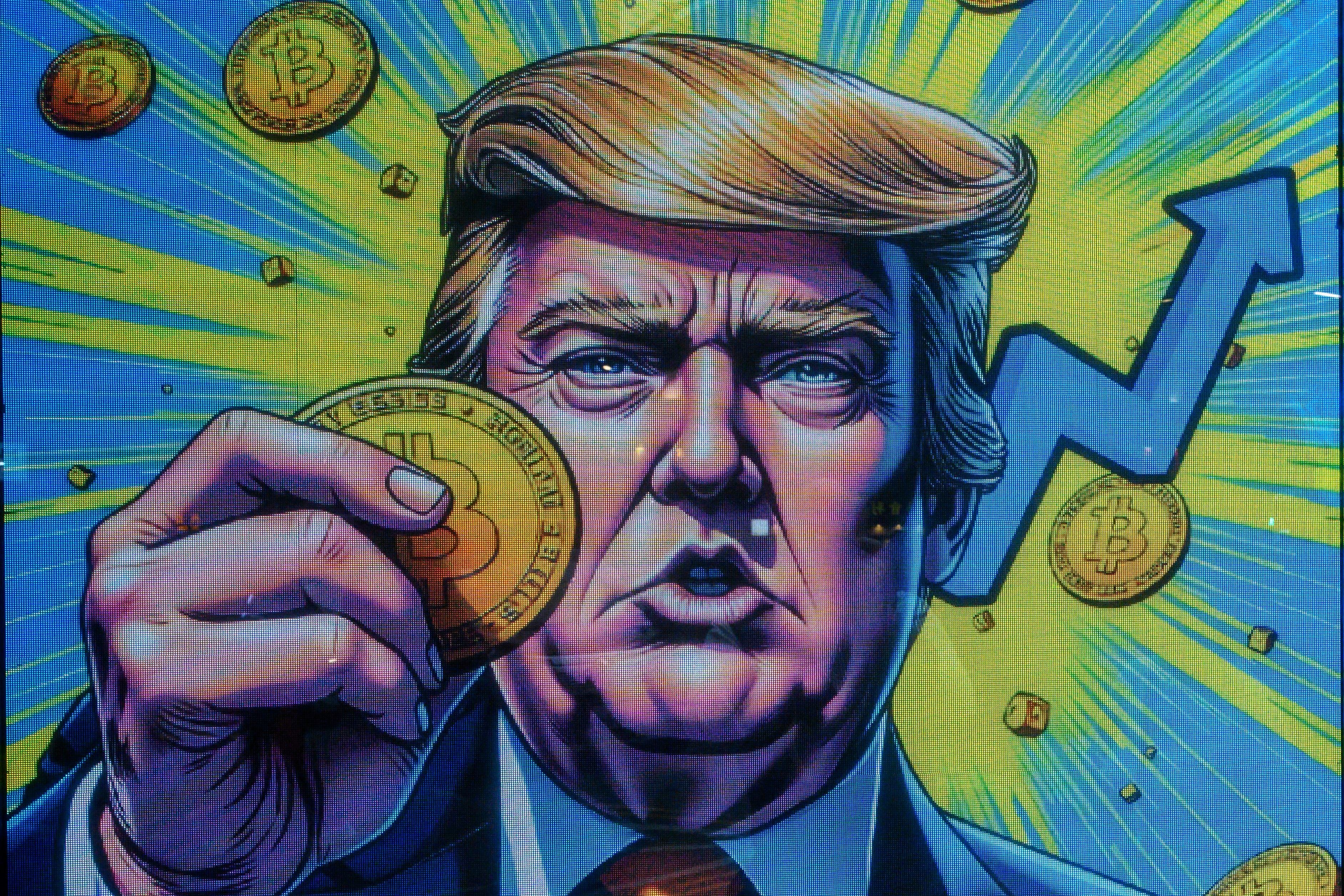 A cryptocurrency exchange office with a screen featuring US President Donald Trump holding cryptocurrency coins in Hong Kong on 12 March, 2025