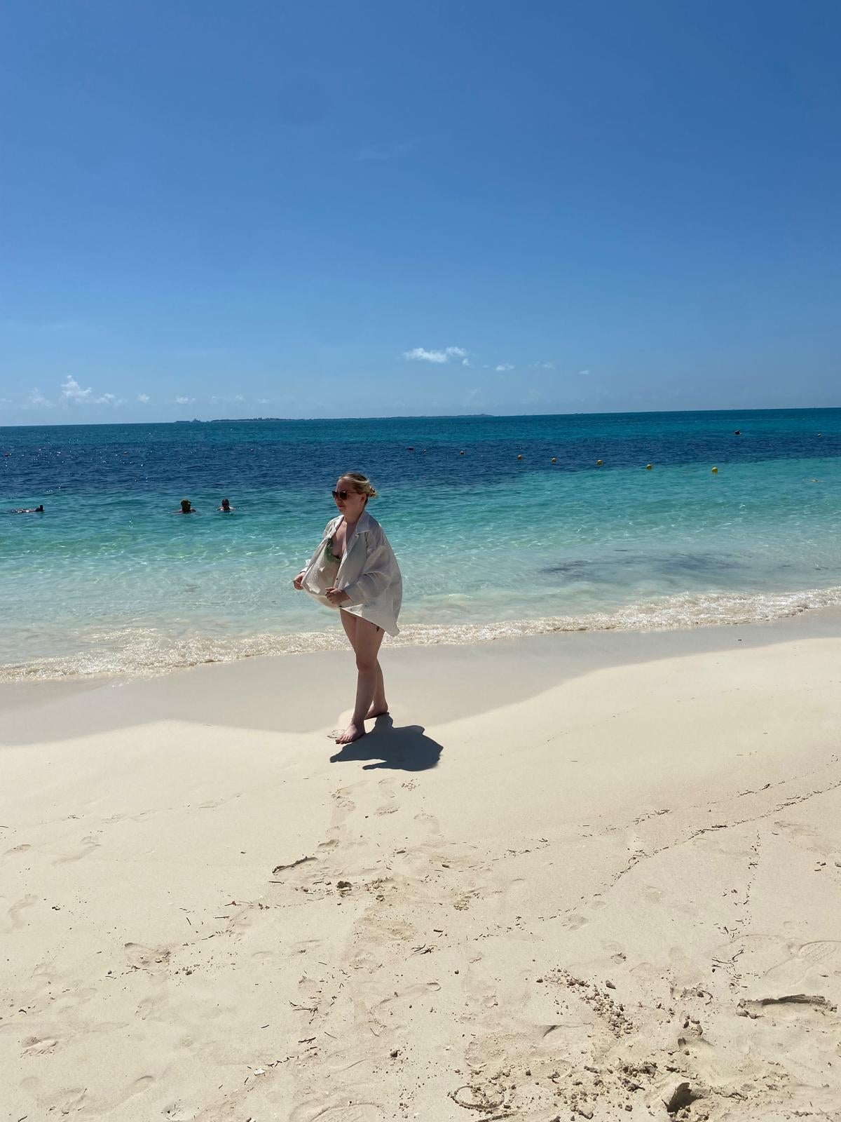 Lily covering up in the sun in Mexico