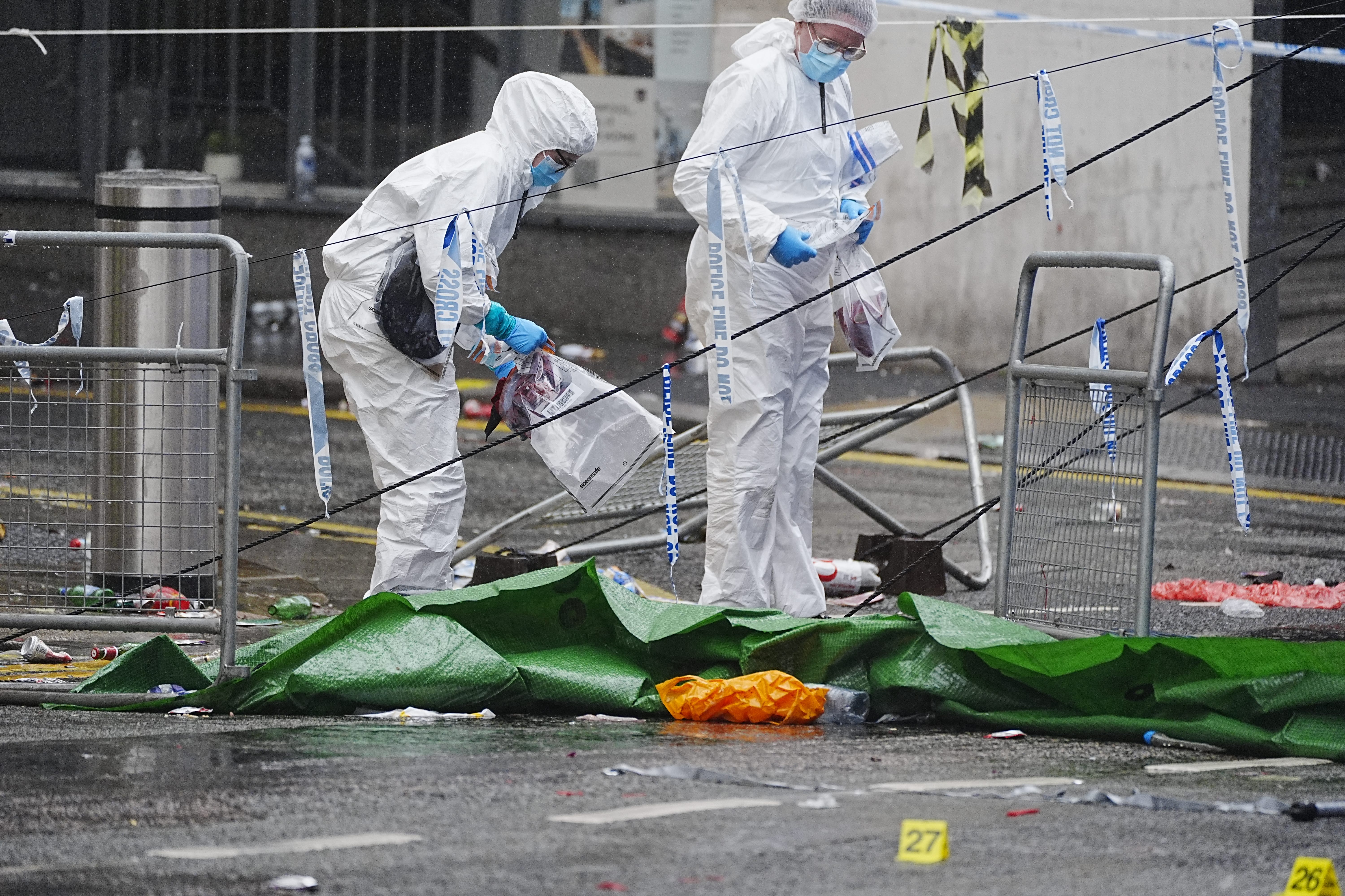 Forensic officers at work at the scene in Water Street, Liverpool (Peter Byrne/PA)