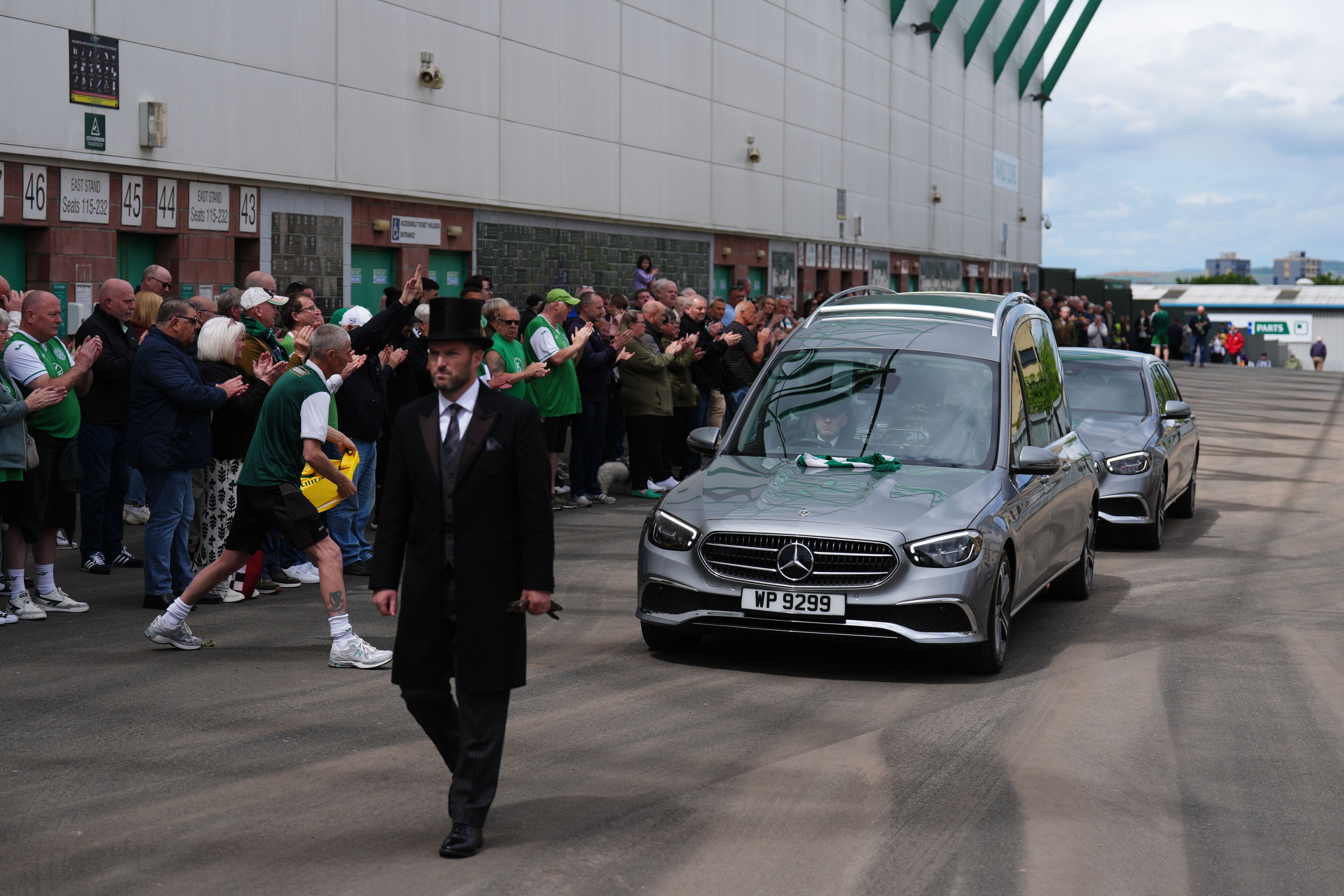 The hearse of Sir Tom Farmer was driven past Easter Road (Andrew Milligan/PA)