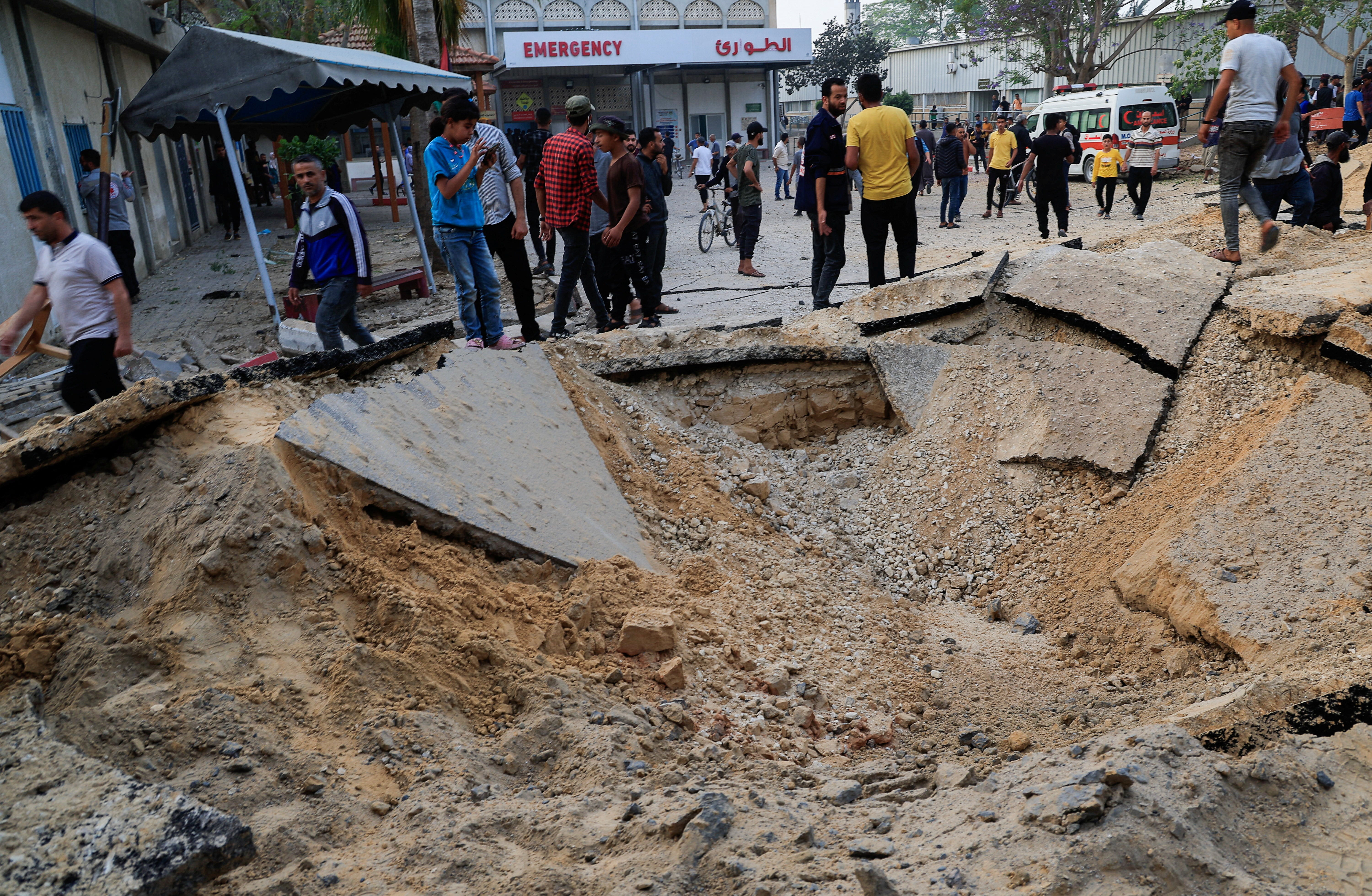 Palestinians inspect the damage at the European Hospital in Khan Younis where Mohammed Sinwar was reportedly killed