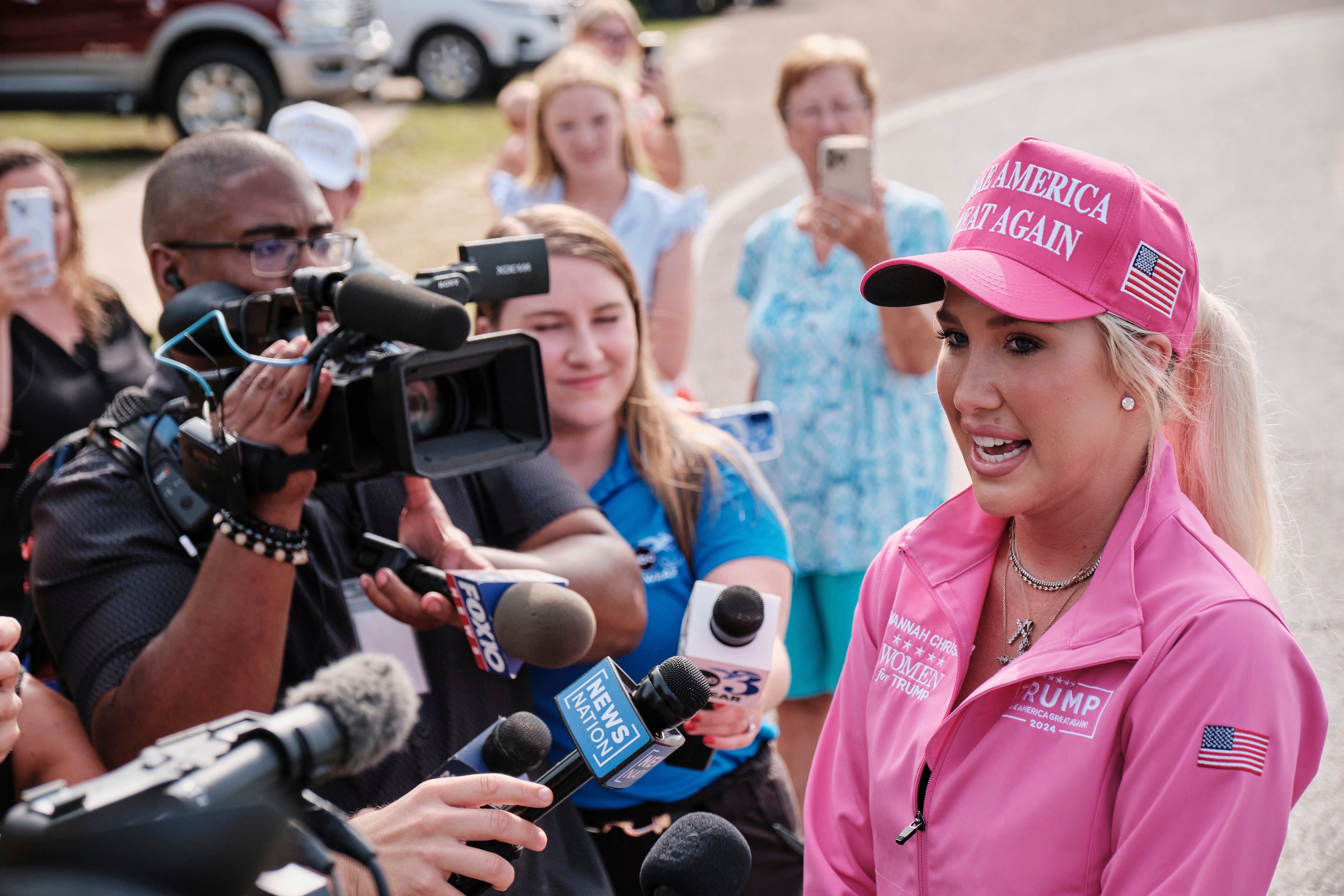 Donning a pink MAGA hat, Savannah Chrisley spoke to the press following the pardons of her parents, Todd and Julie Chrisley. She lobbied the White House for their release.