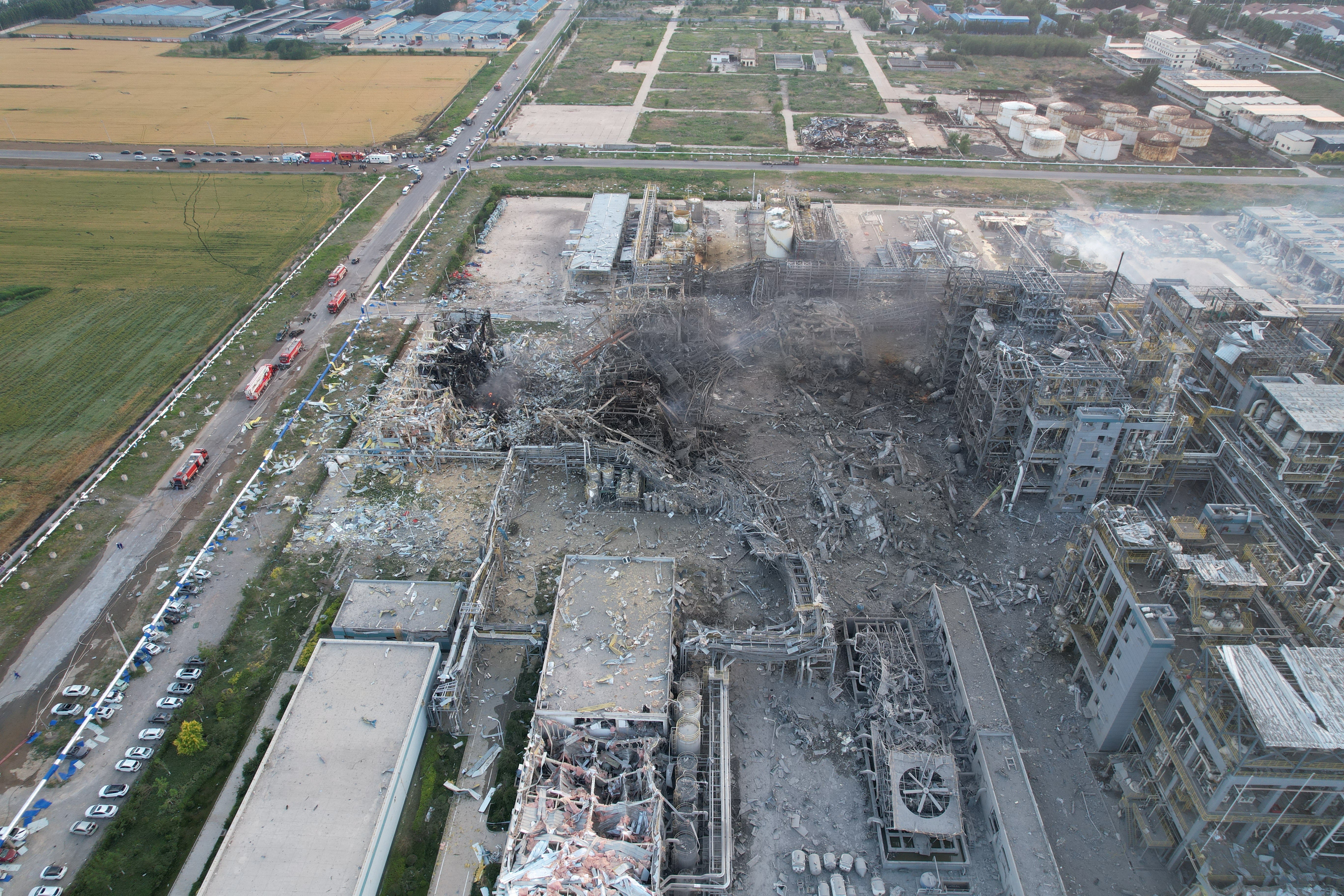 Rescuers work at the chemical plant operated by Shandong Youdao Chemical in Gaomi