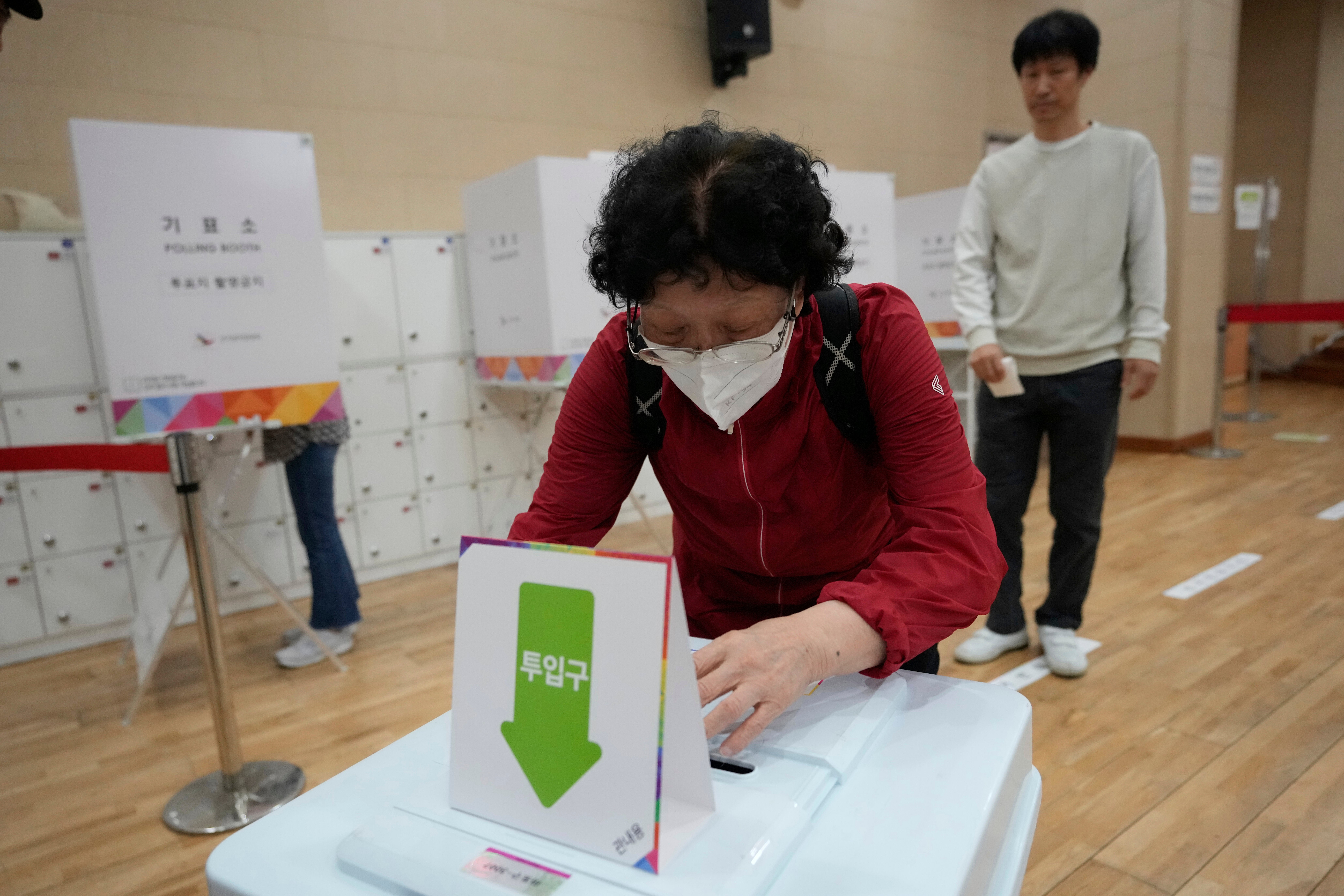 A woman casts her vote in the South Korean election