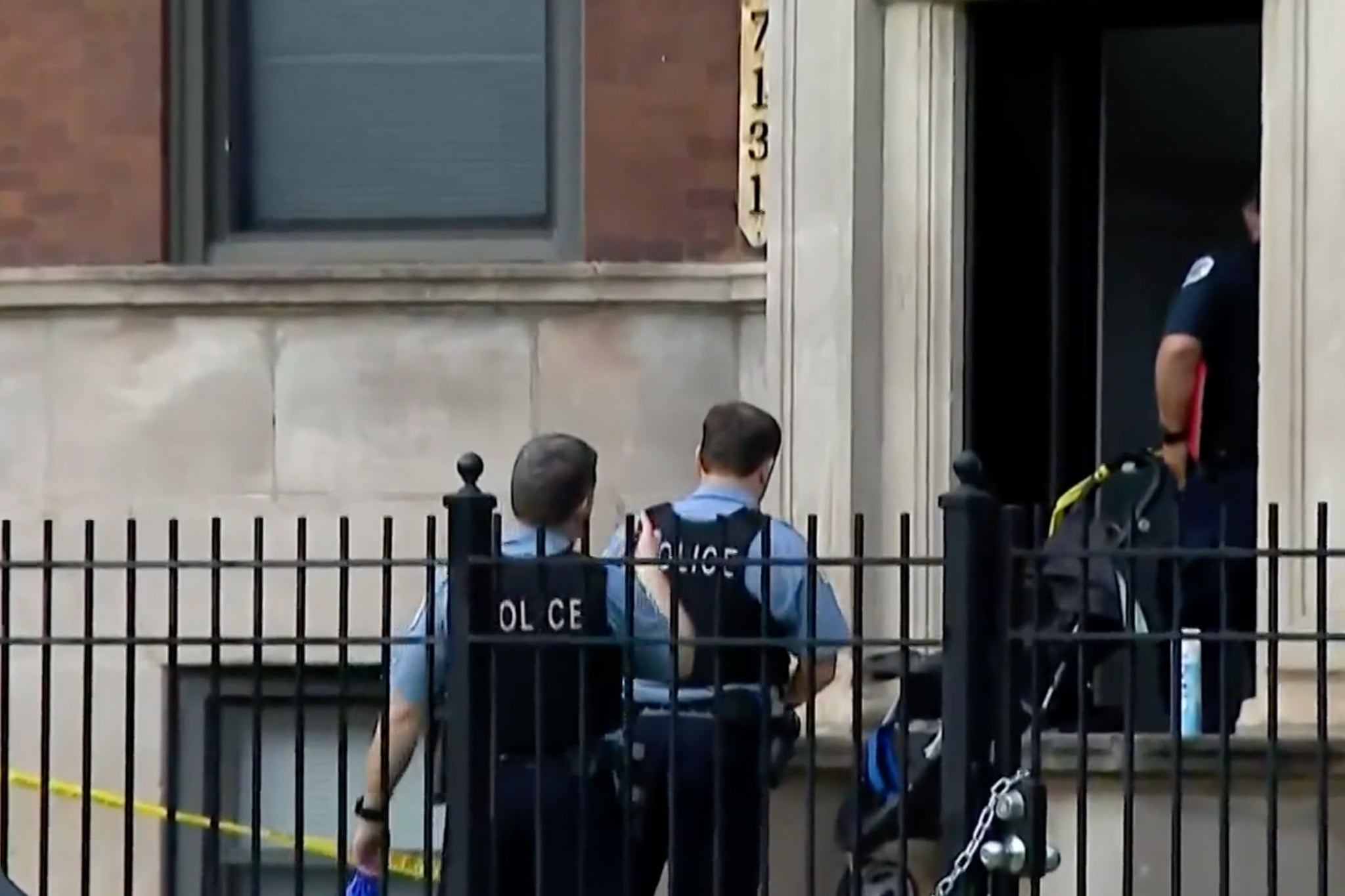 Police are seen entering the home where the tragedy unfolded on Wednesday night