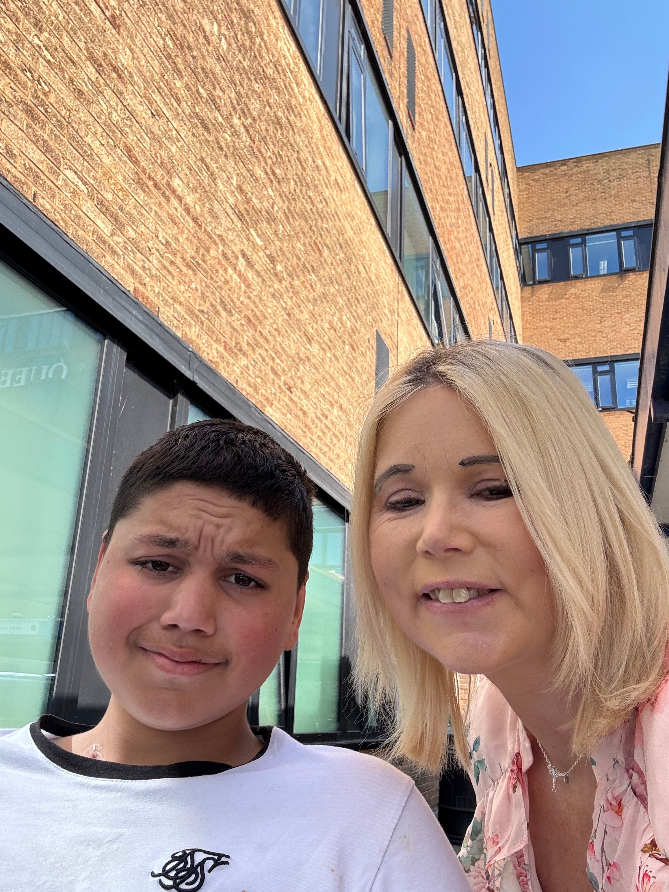 Reece Khan with his mum, Selina Niman, 51