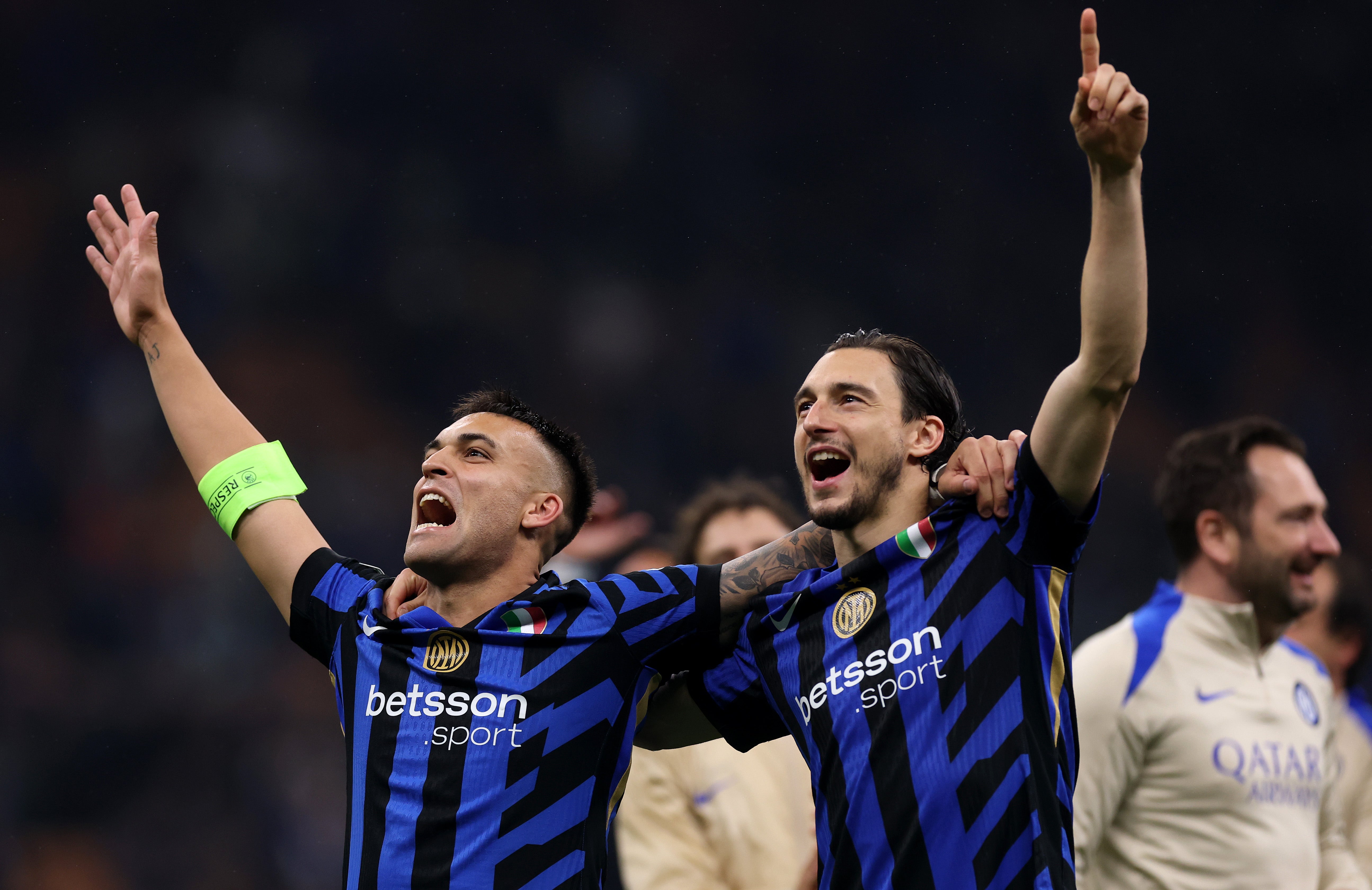 Lautaro Martinez and Matteo Darmian celebrate victory over Barcelona
