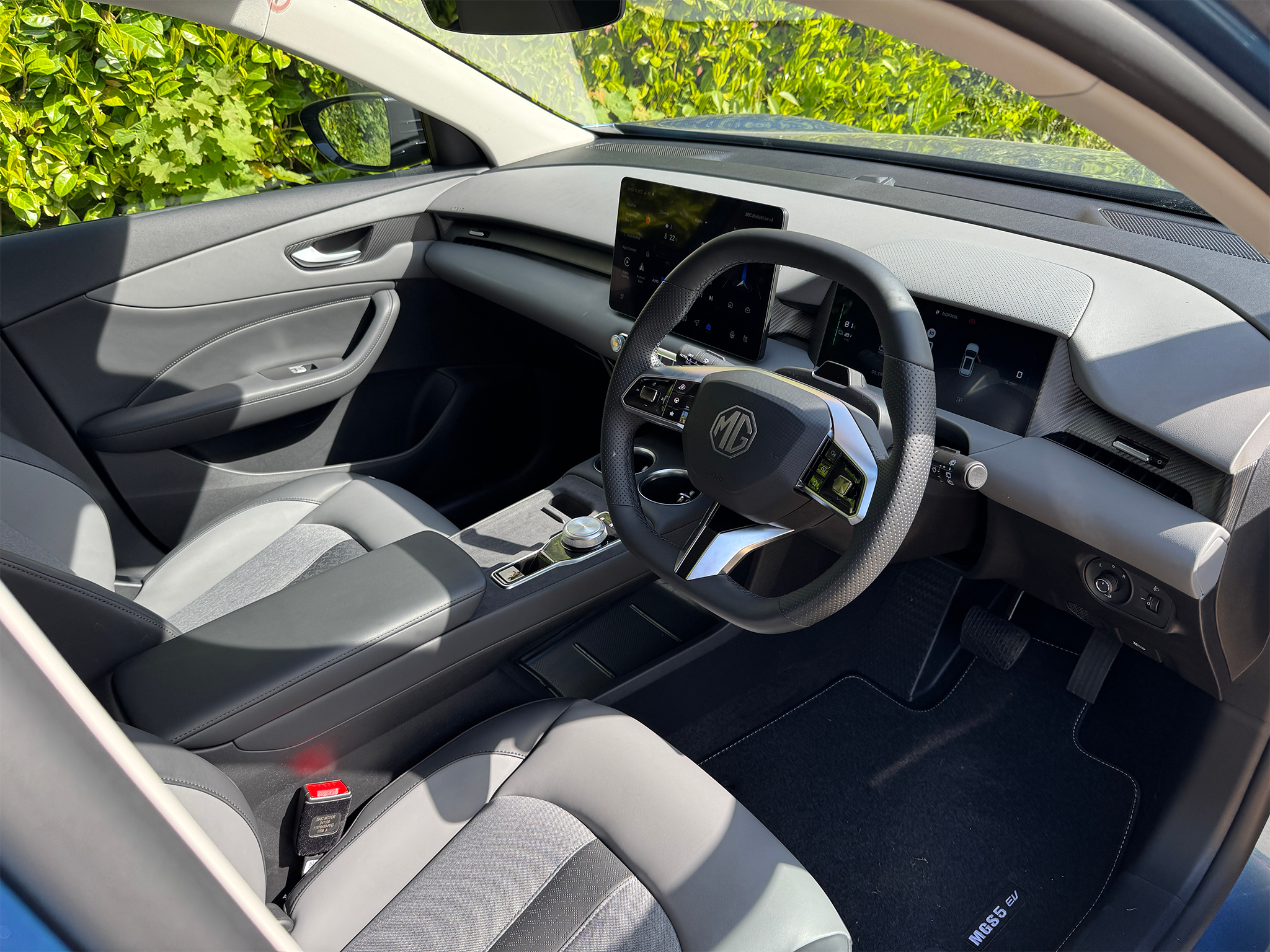 The 12.8in infotainment touchscreen gets separate buttons for heating and ventilation