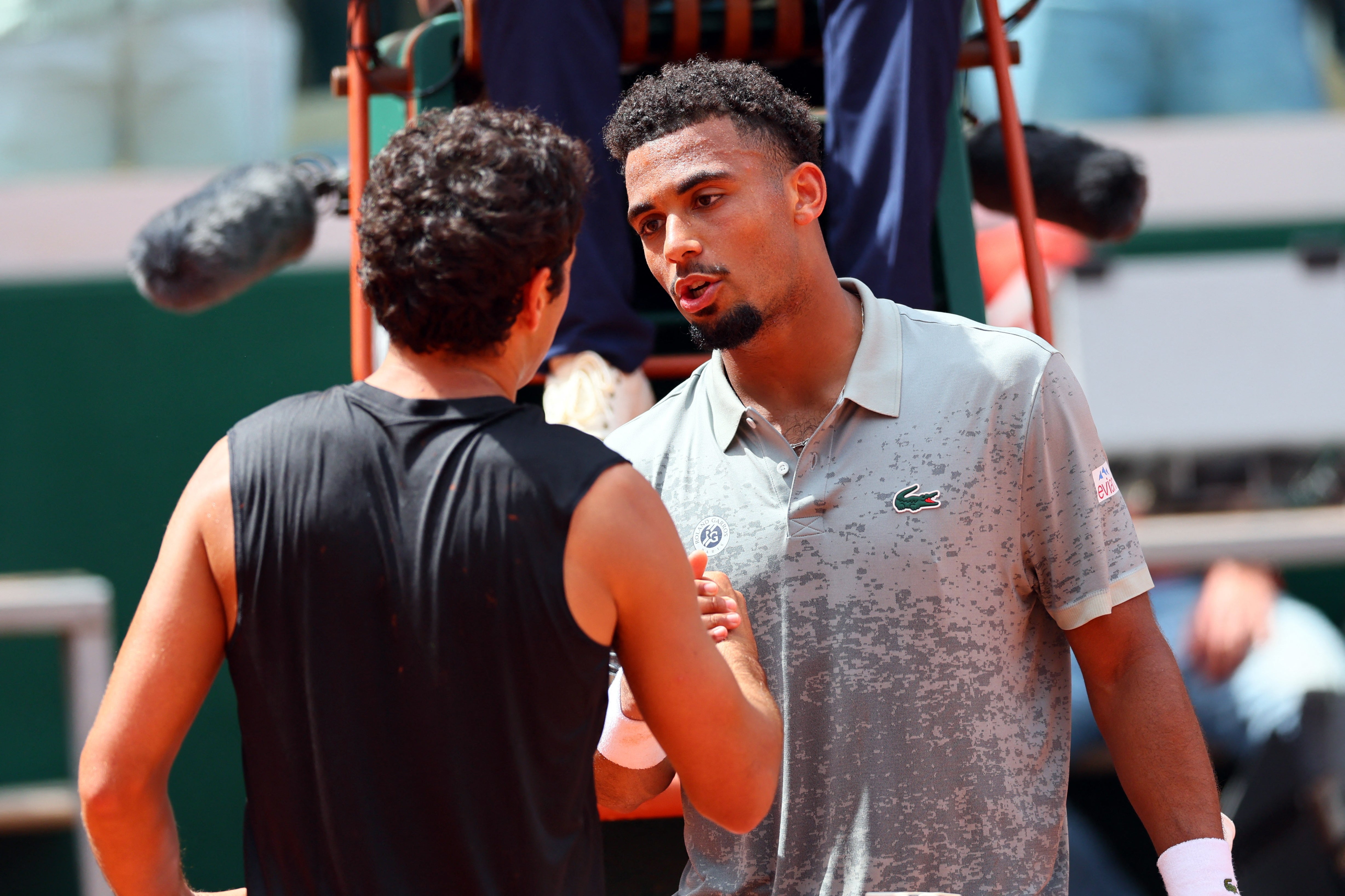 Fils shakes hands with Spain's Jaume Munar after winning match point