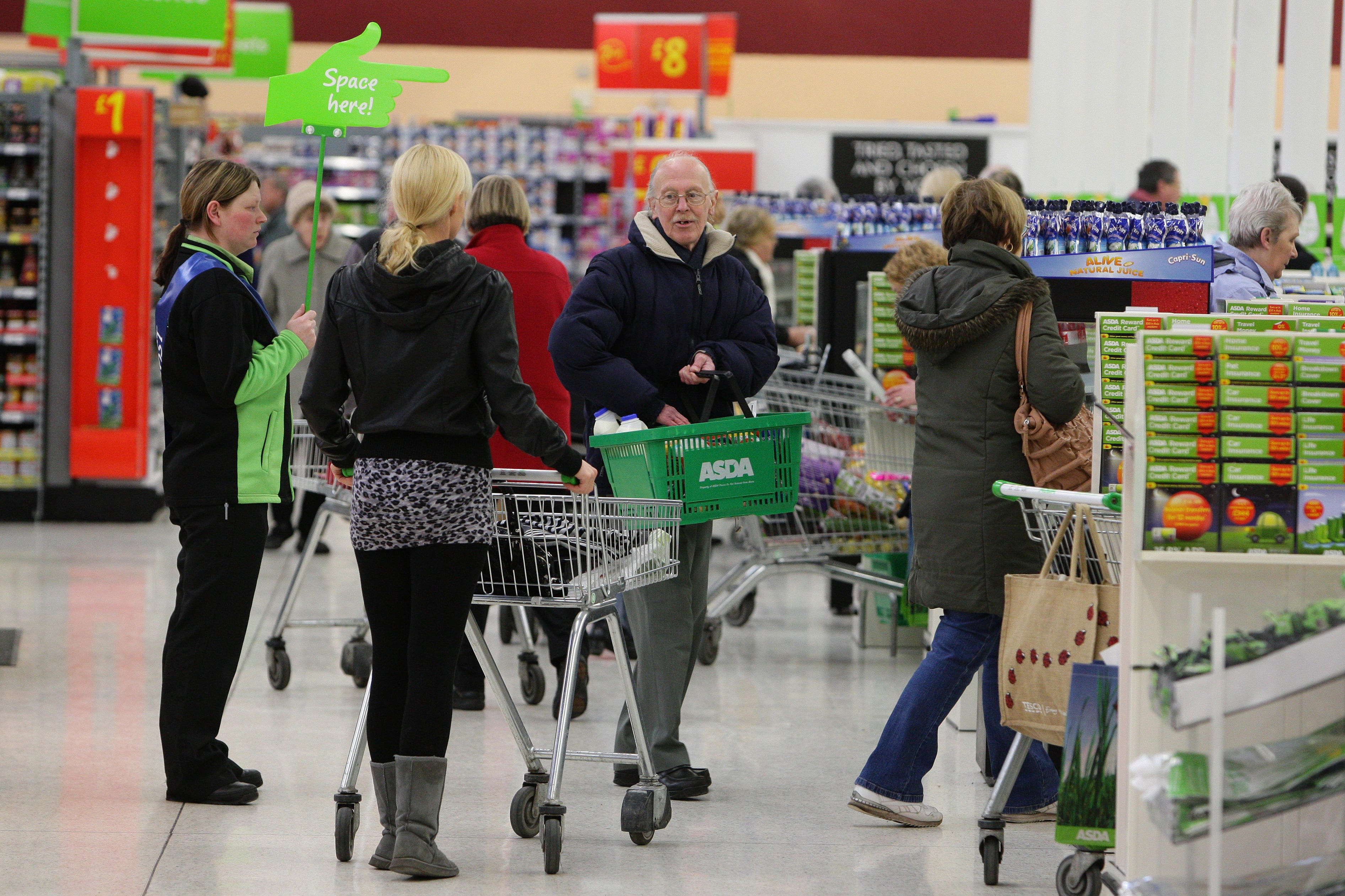 Shoppers at an Asda supermarket (Dave Thompson/PA)