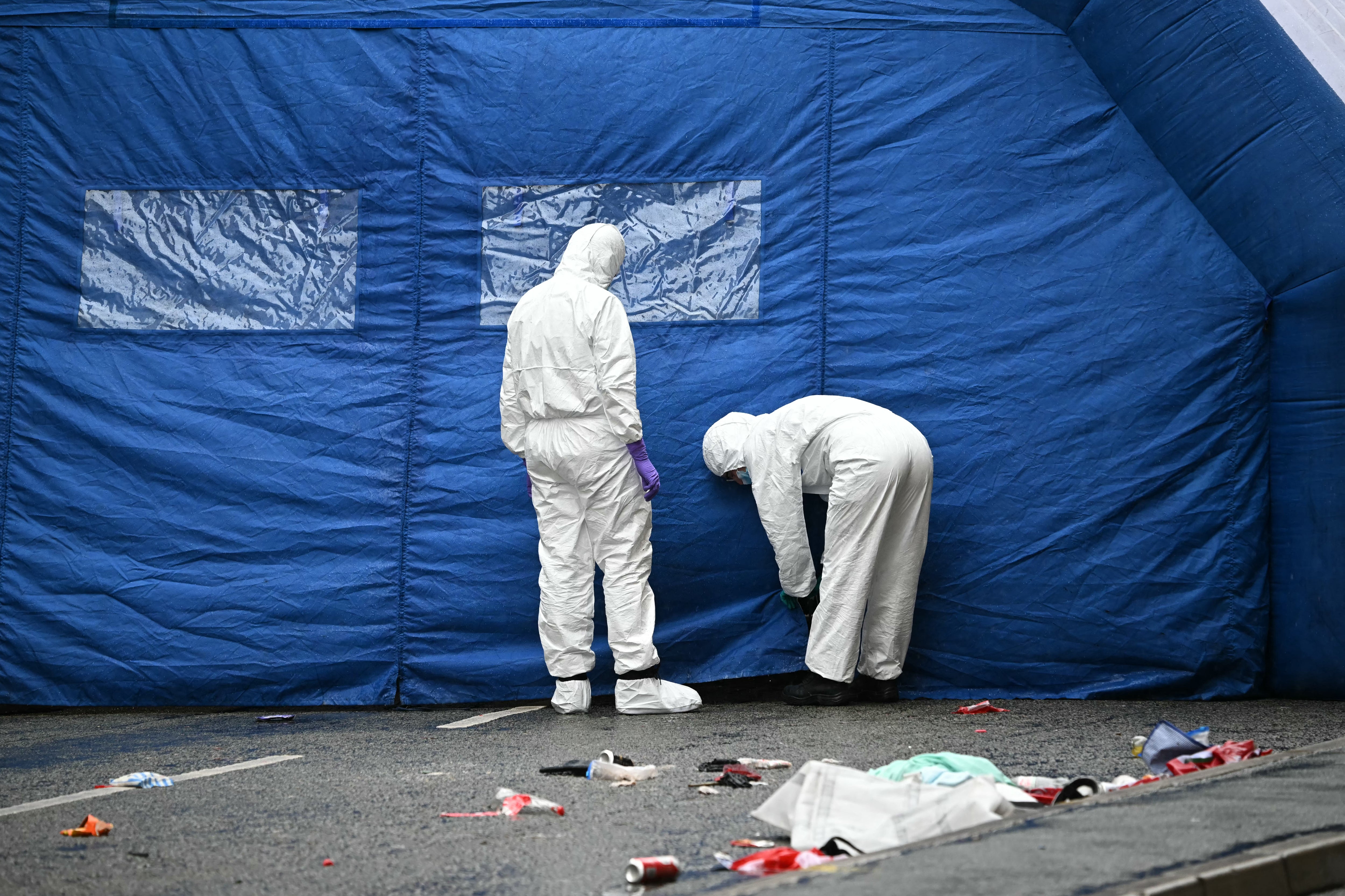 The scene in Liverpool where a car ploughed into crowds during Liverpool's Premier League trophy parade