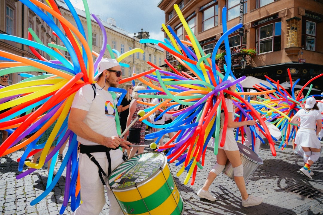 Pride celebrations in Prague take place in cobbled streets among baroque facades, in the shadow of Prague Castle