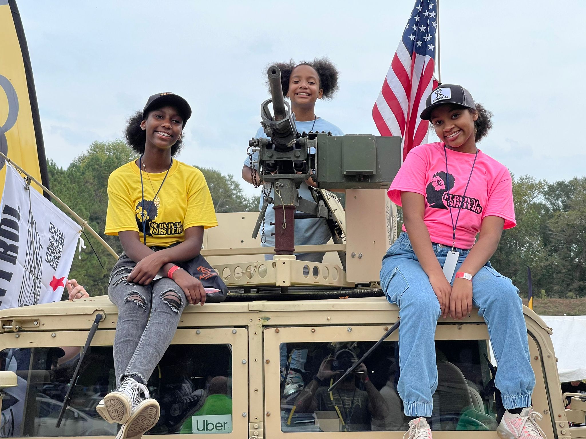 Naomi (left) age 12; Charli (center) age 10, and Kennedy (right) age 13 attending a gun show with their father, Fred (taking the picture.) Their oldest sister Brooke didn’t come along to this one, although Fred says she was a regular attendee with the family before she went to college
