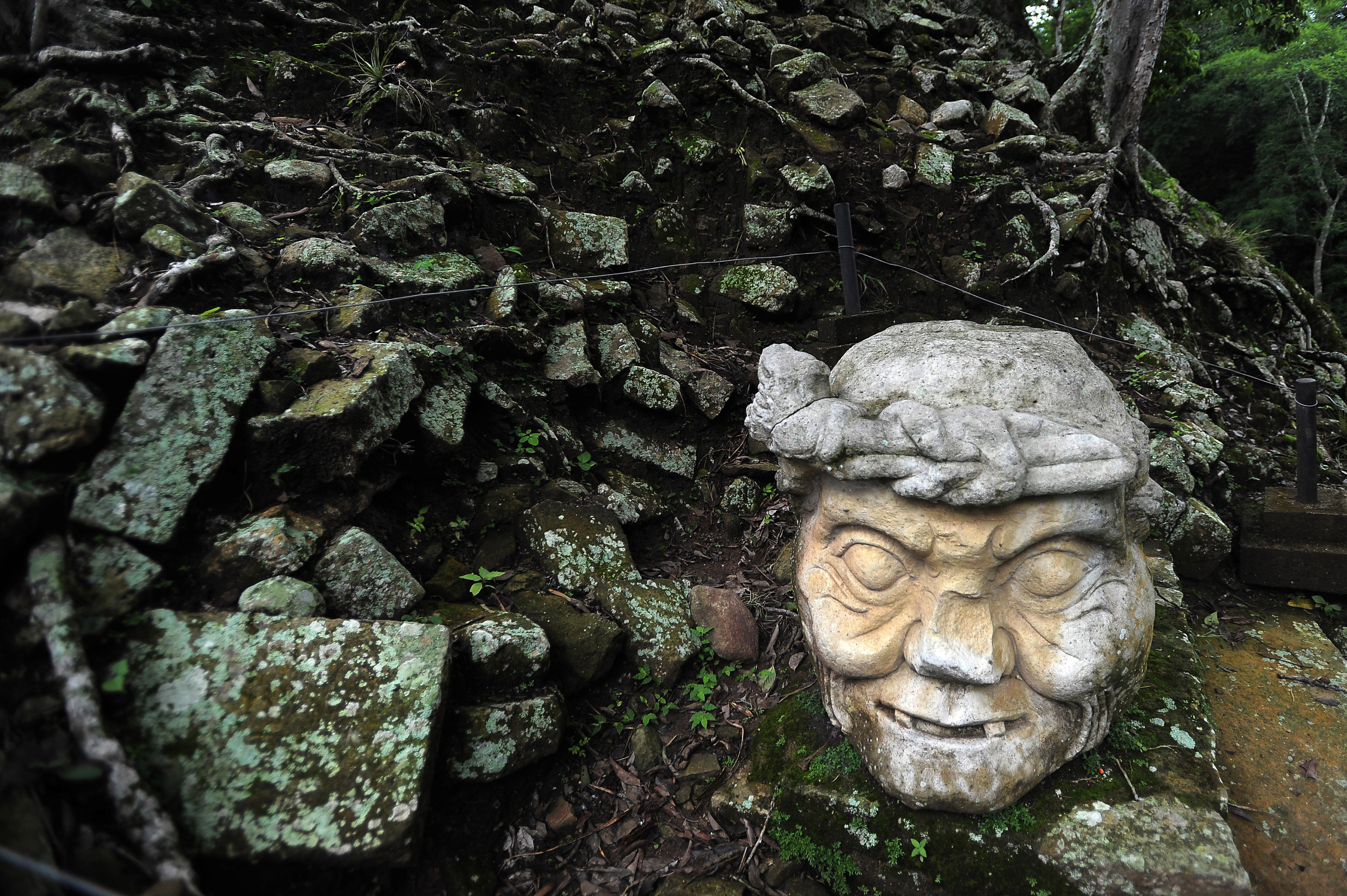 A sculpted stone is seen at Copan