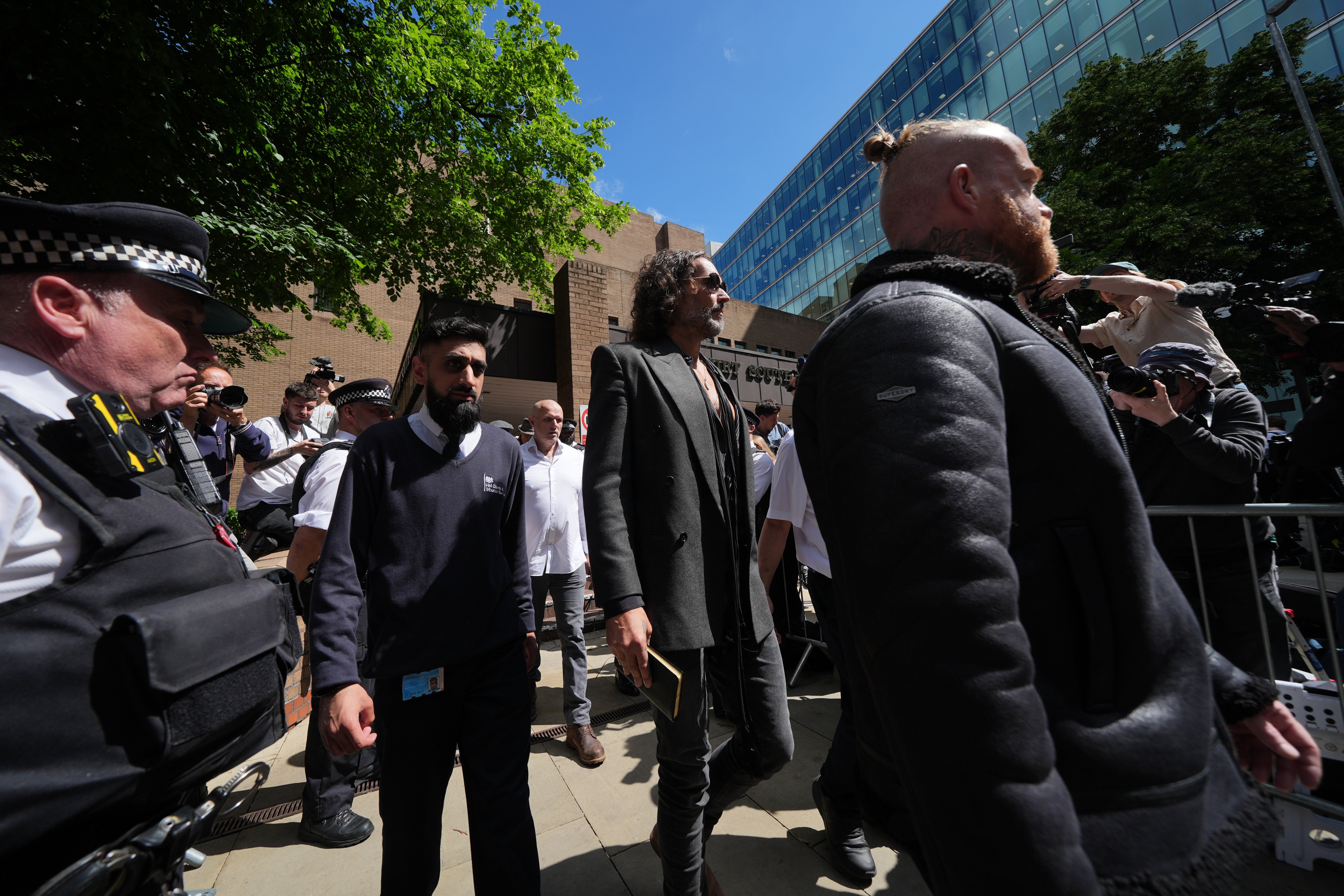 Brand leaves Southwark Crown Court in London on Friday