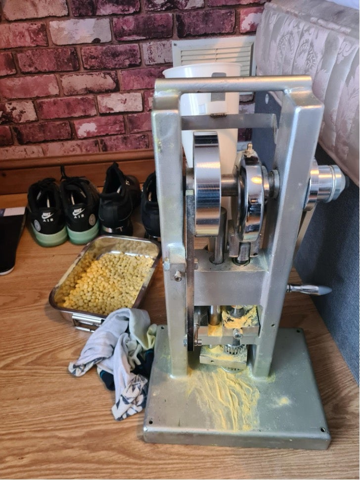 Enos manufactured the pills using cutting agents and a pill press in his bedroom