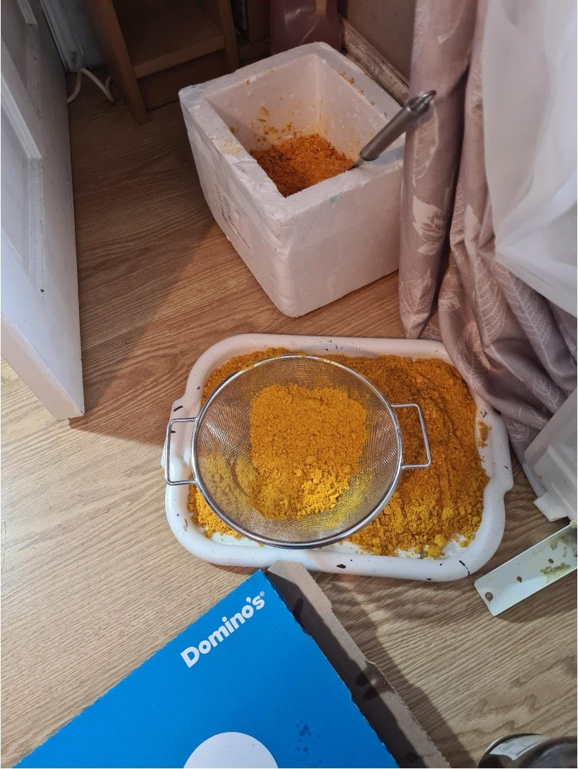 Police found a large quantity of orange powder in his home