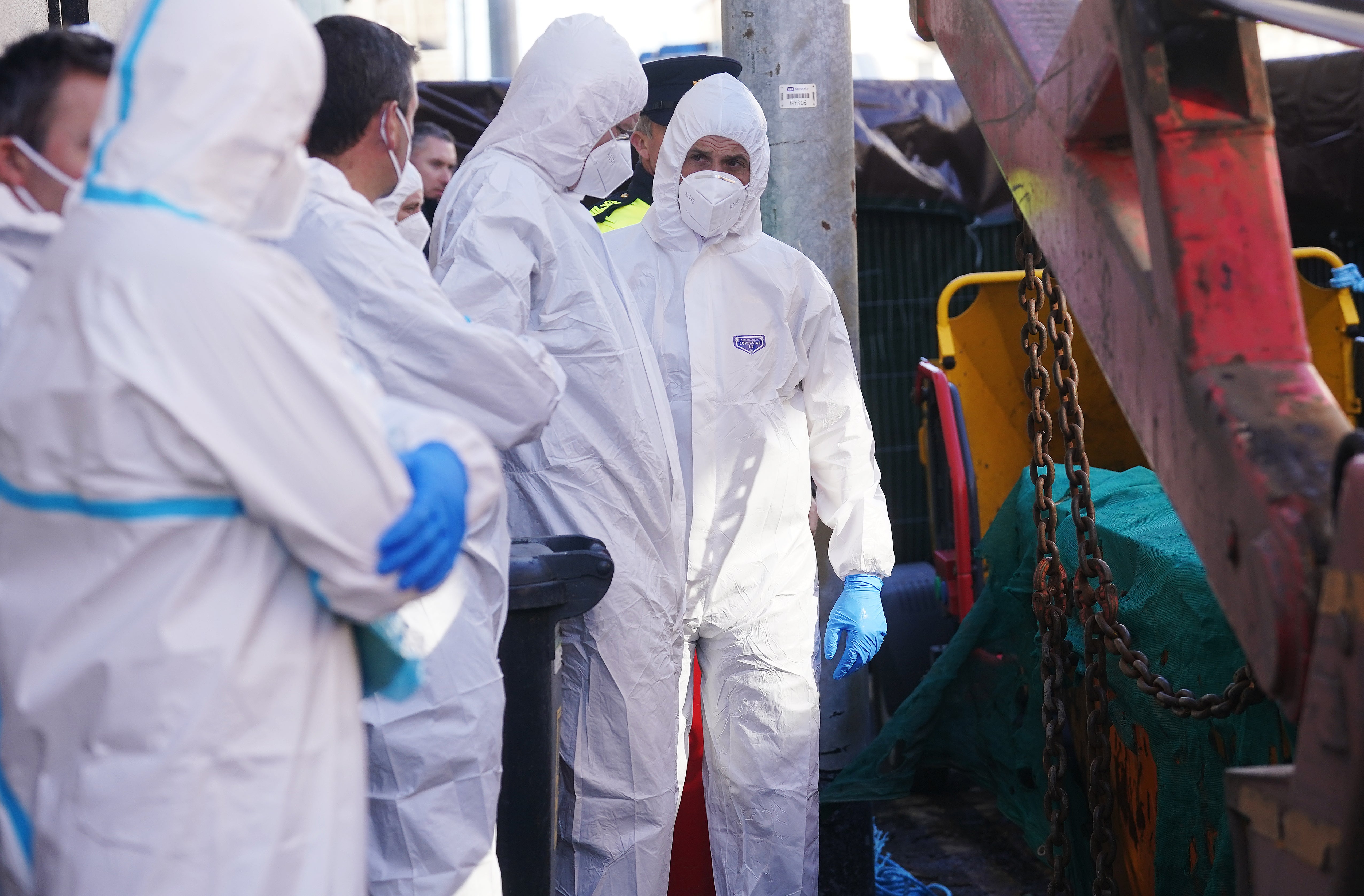 Forensics workers at the couple’s home