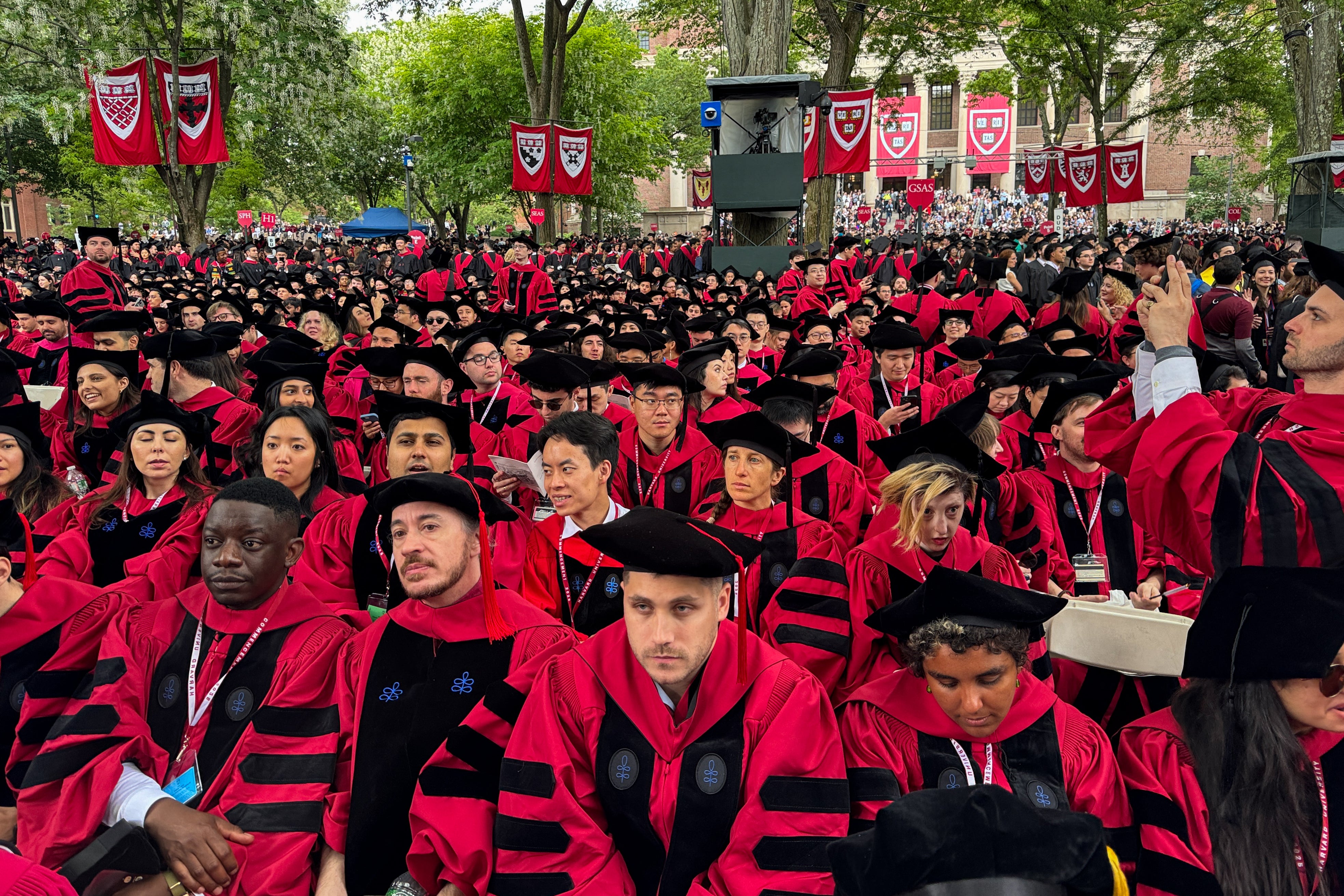 Harvard students graduated as the administration plotted ways to attack the university