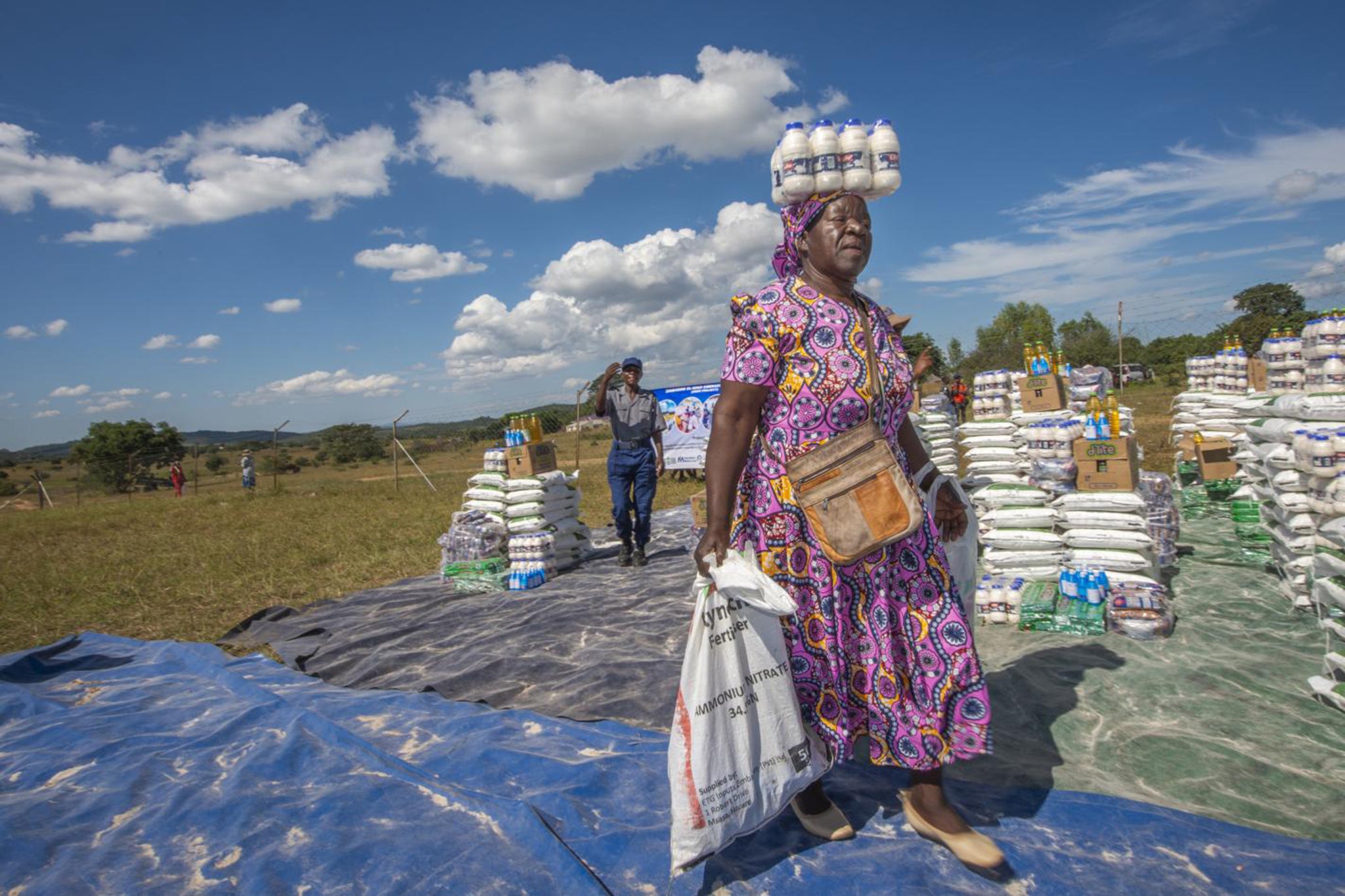 A woman collects supplies in Zimbabwe during the ongoing drought. OCHA’s data service suggests that the country’s drought response plan has received only ten per cent of its funding