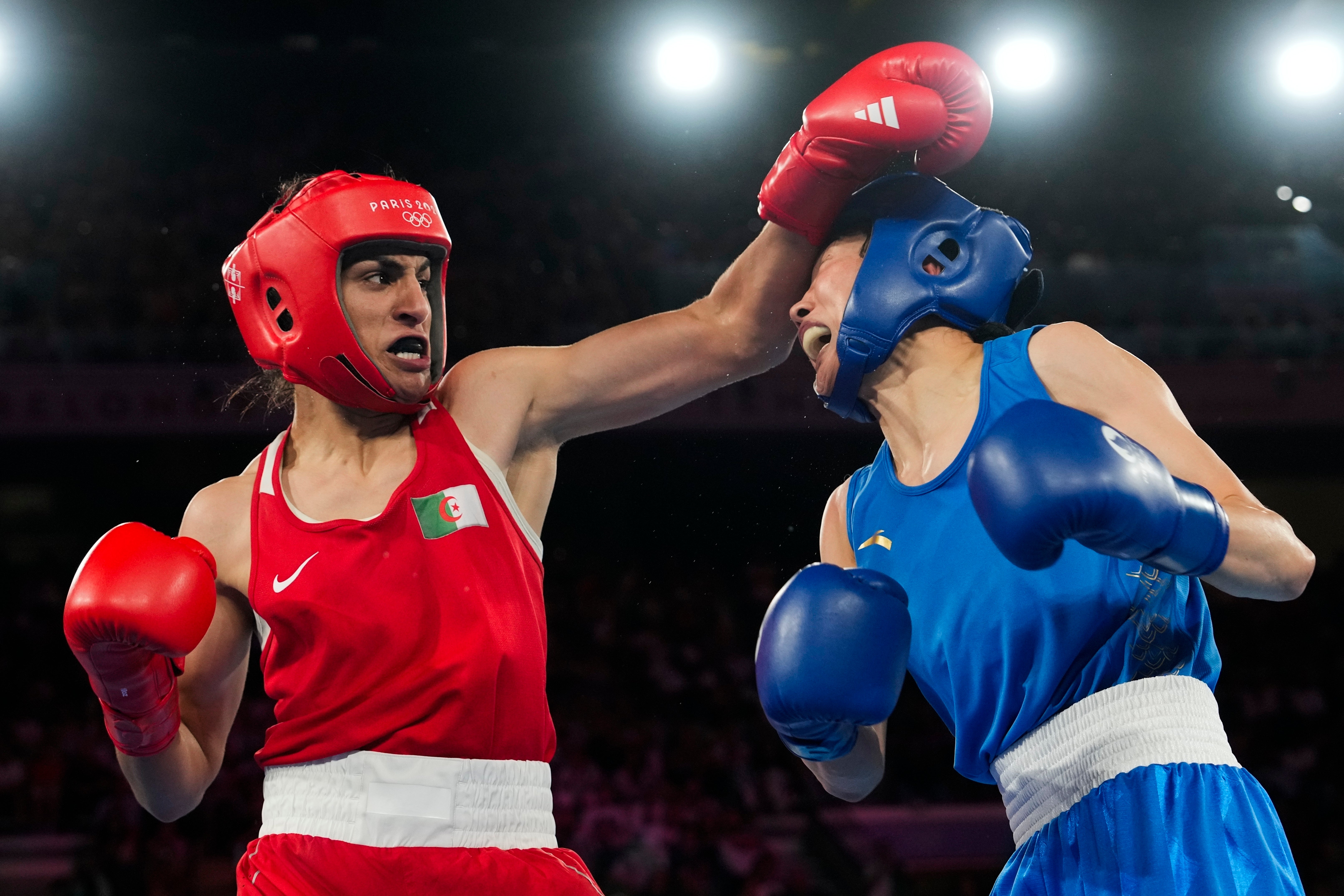 Imane Khelif (left) won Olympic gold in 2024 after being DQed from the 2023 World Championships