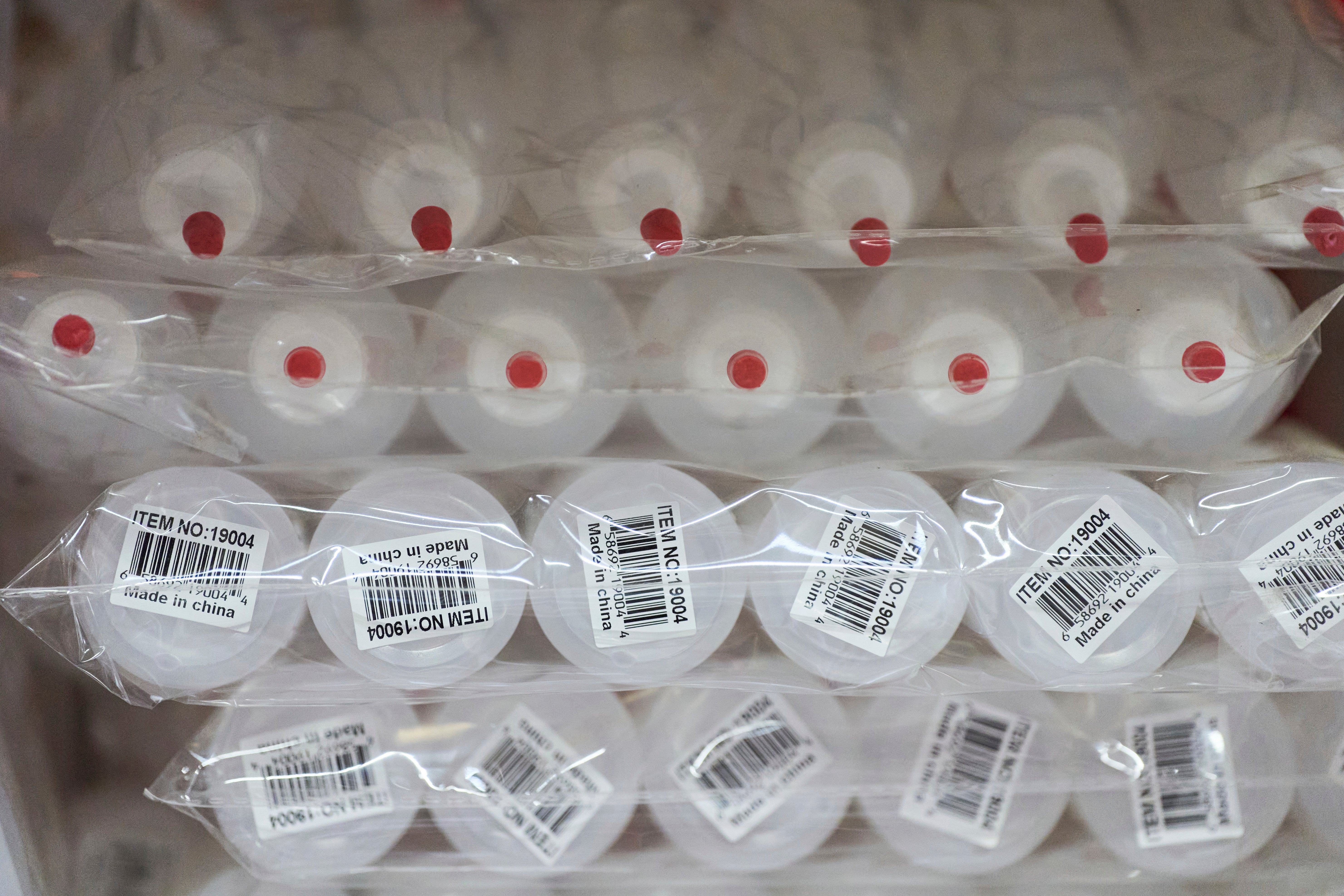 ‘Made in China’ stickers seen on plastic squeeze bottles typically used for hair dye application at a beauty products wholesaler in Doraville on 9 May 2025