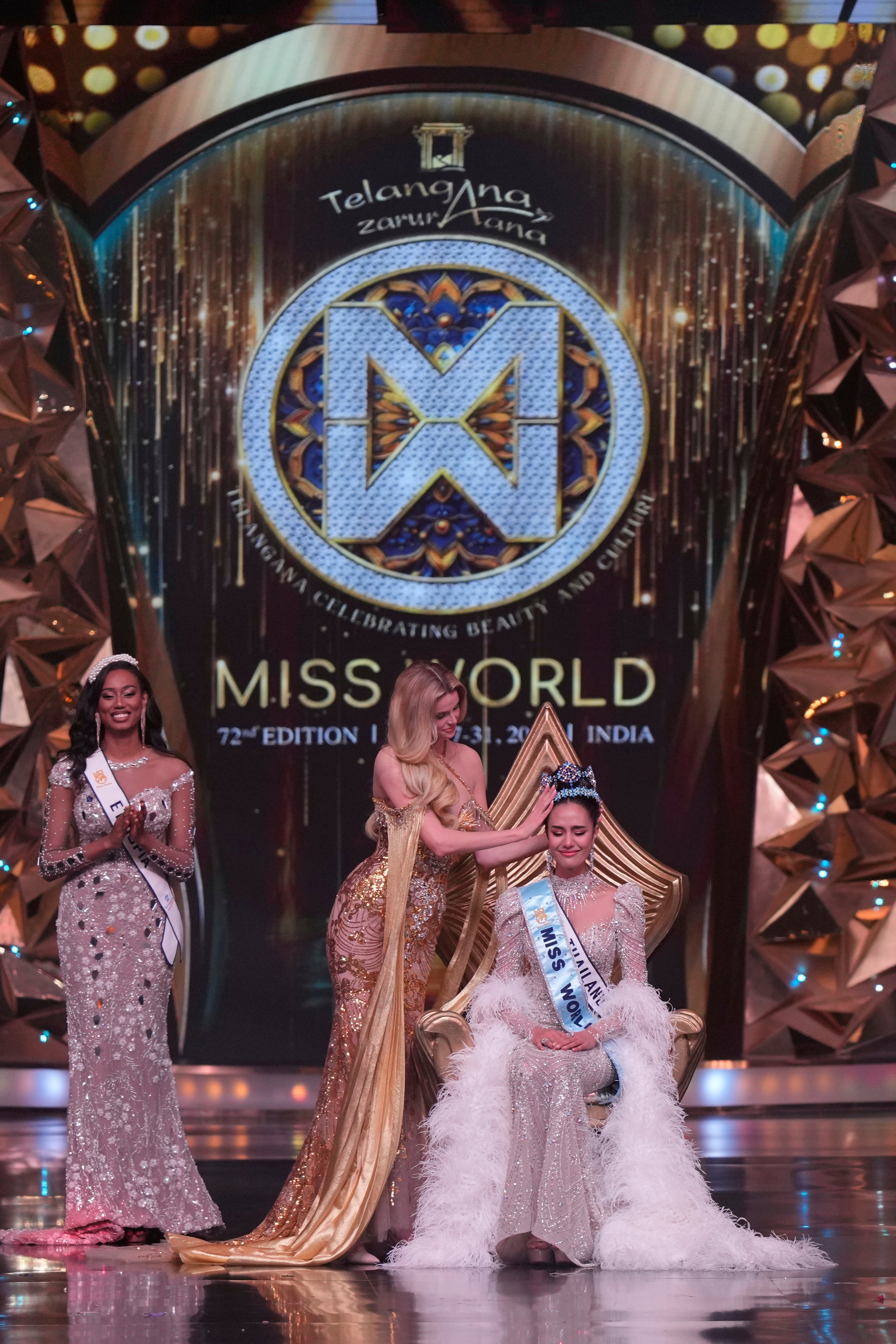 Krystyna Pyszkova crowns her successor Opal Suchata of Thailand after she won the 72nd Miss World contest in India
