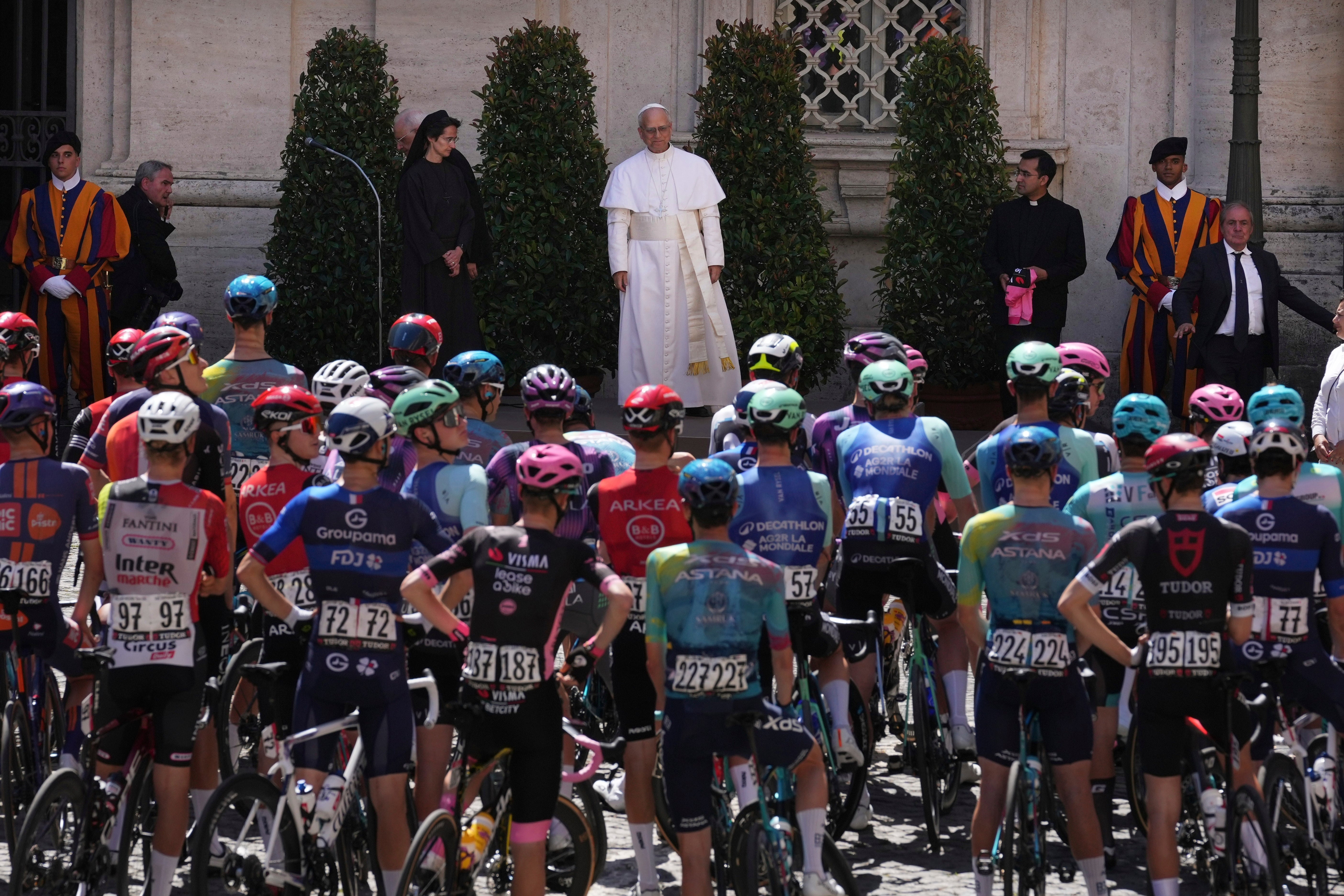 The Pope blesses the pack of cyclists