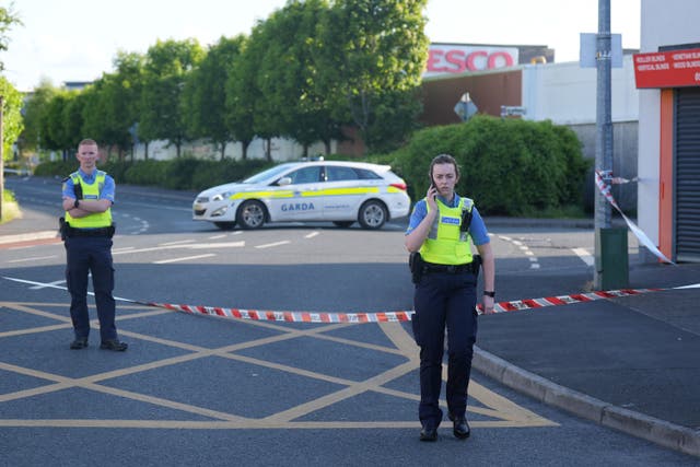<p>Garda near to the scene at Fairgreen Shopping Centre, Carlow</p>