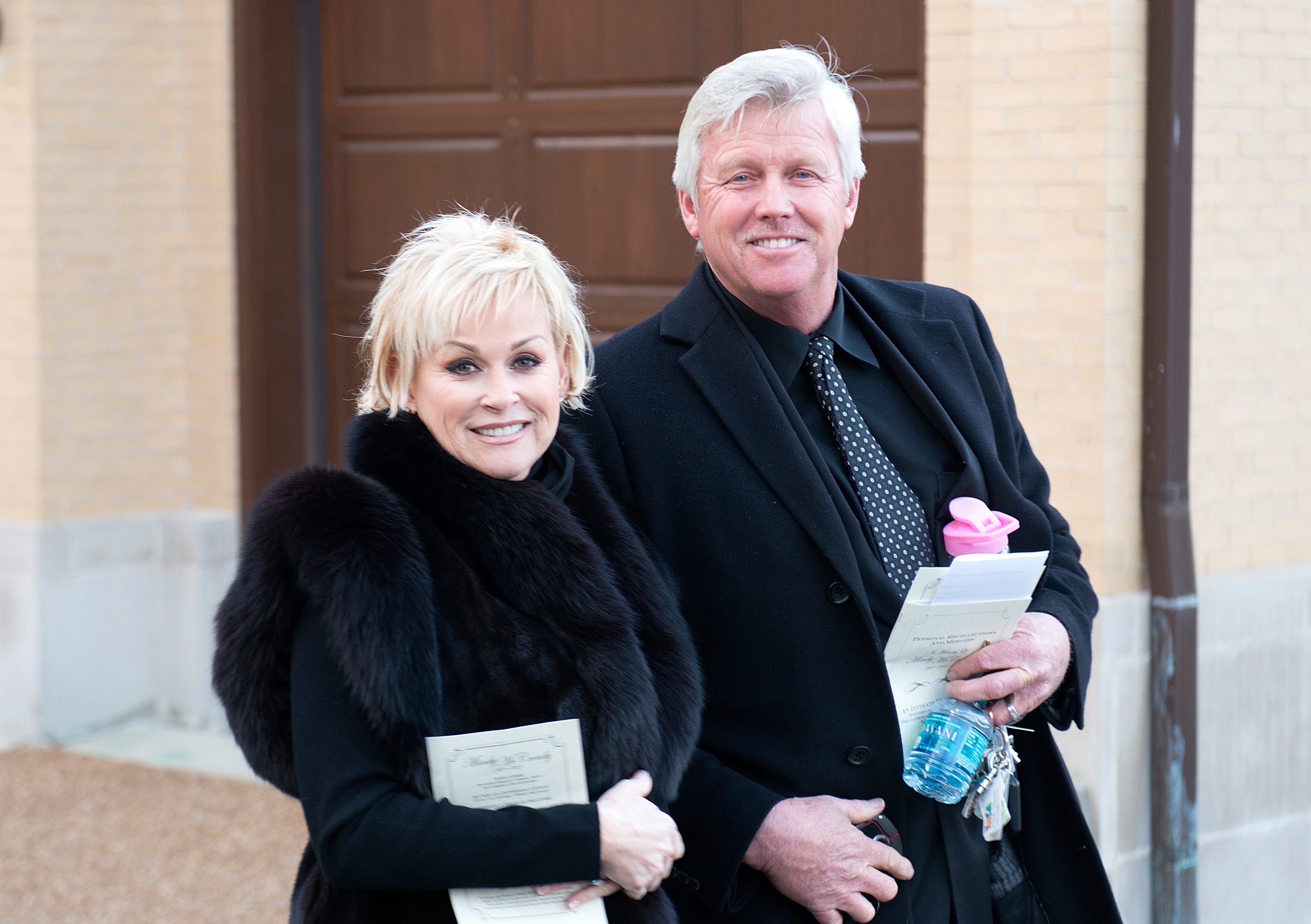 Lorrie Morgan and Randy White pictured in 2013, attending the funeral of Mindy McCready