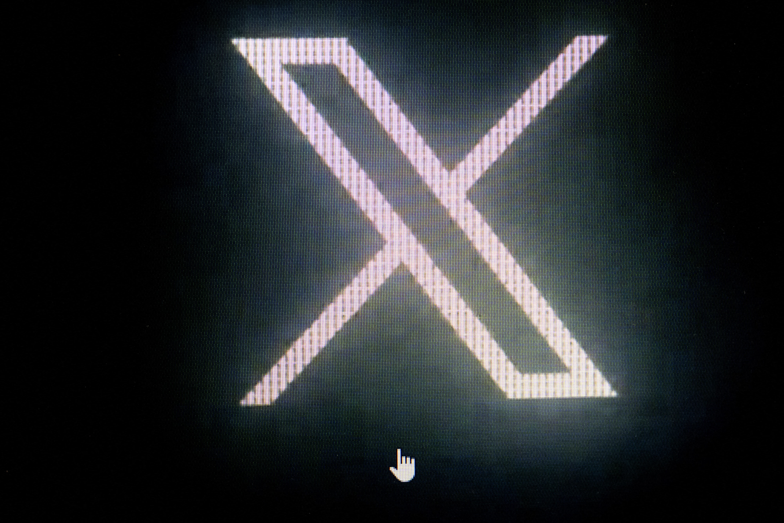 The X logo pictured in Paris on 24 July, 2023. Owner Elon Musk rolled out a new private chat feature for the app in June 2025