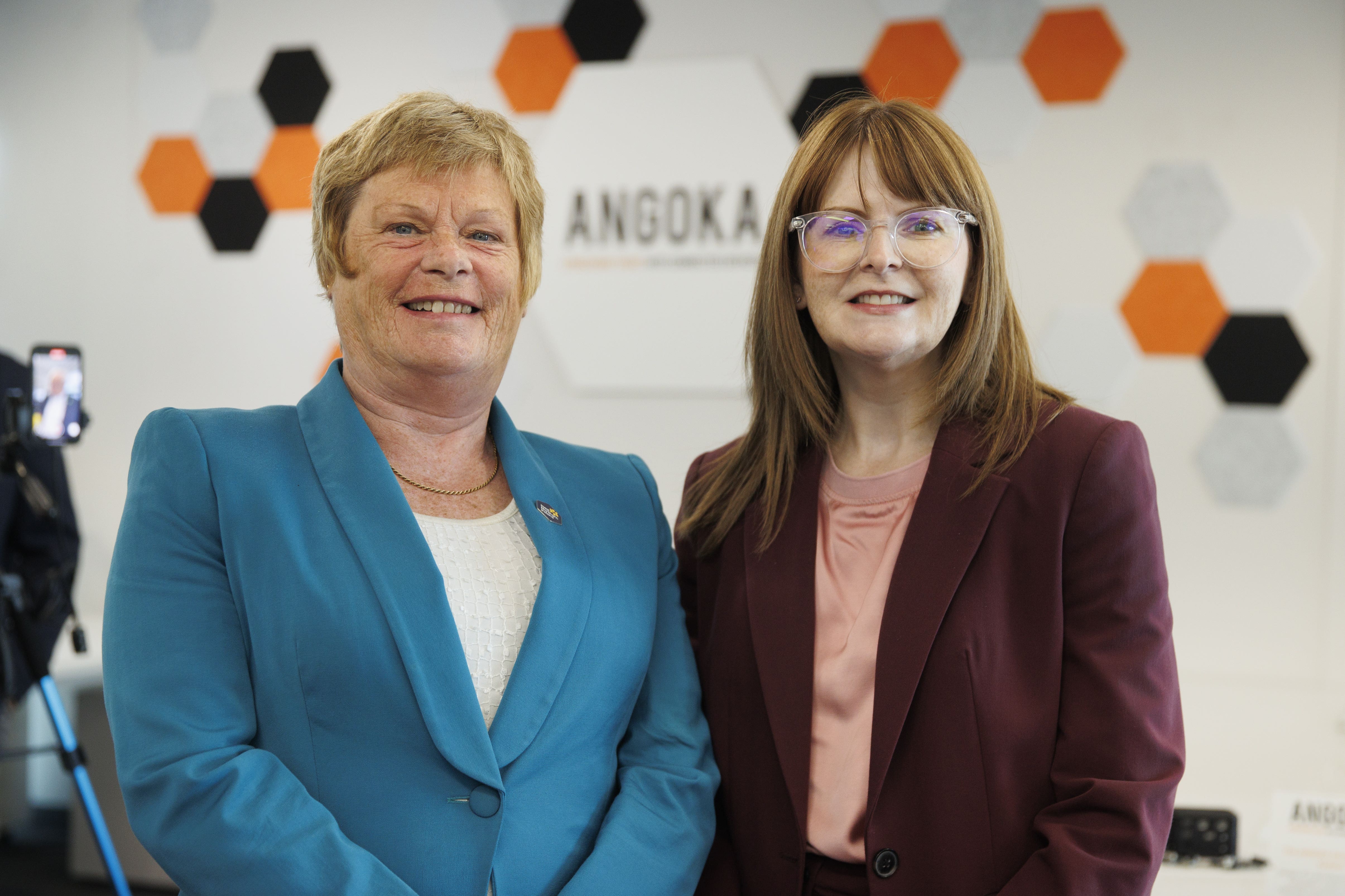 Invest NI director of innovation, research and development Dr Vicky Kell (left) and Economy Minister Caoimhe Archibald speak to the media following the investment announcement (Liam McBurney/PA)
