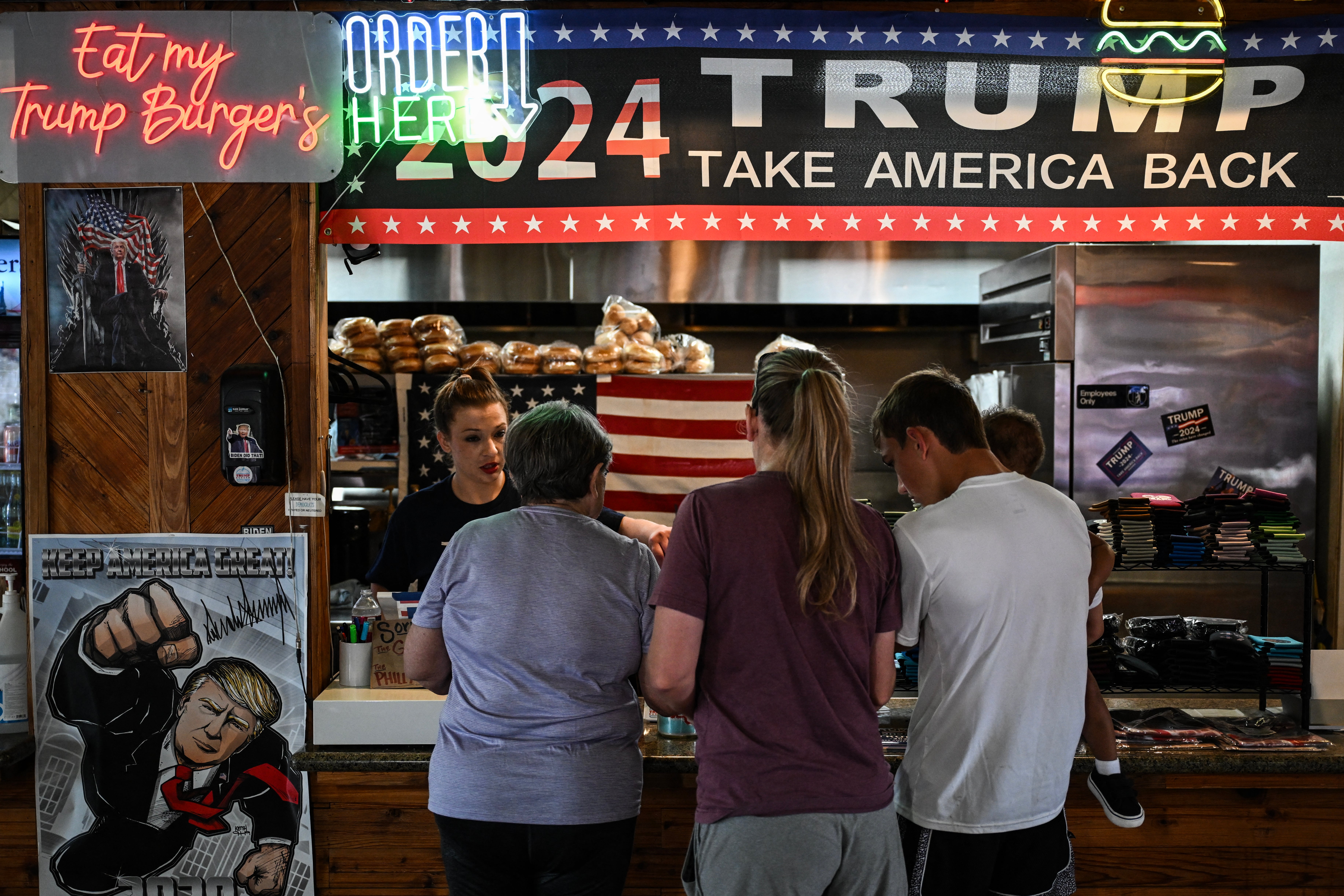 Diners place their orders at Trump Burger in Bellville, Texas