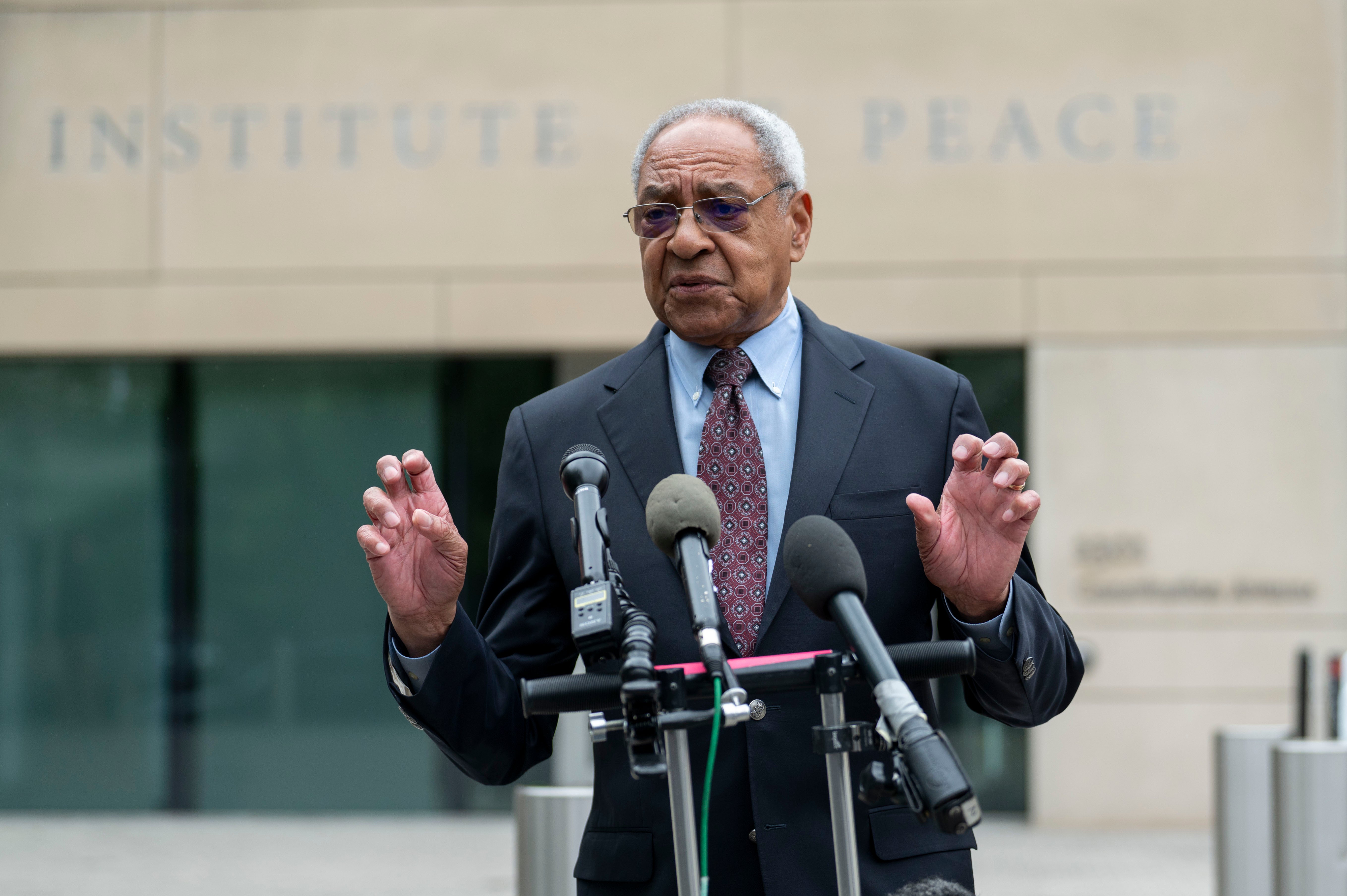 U.S. Institute of Peace president George Moose last month after being allowed back into the publicly-funded nonprofit's D.C. headquarters following an attempted takeover by DOGE.