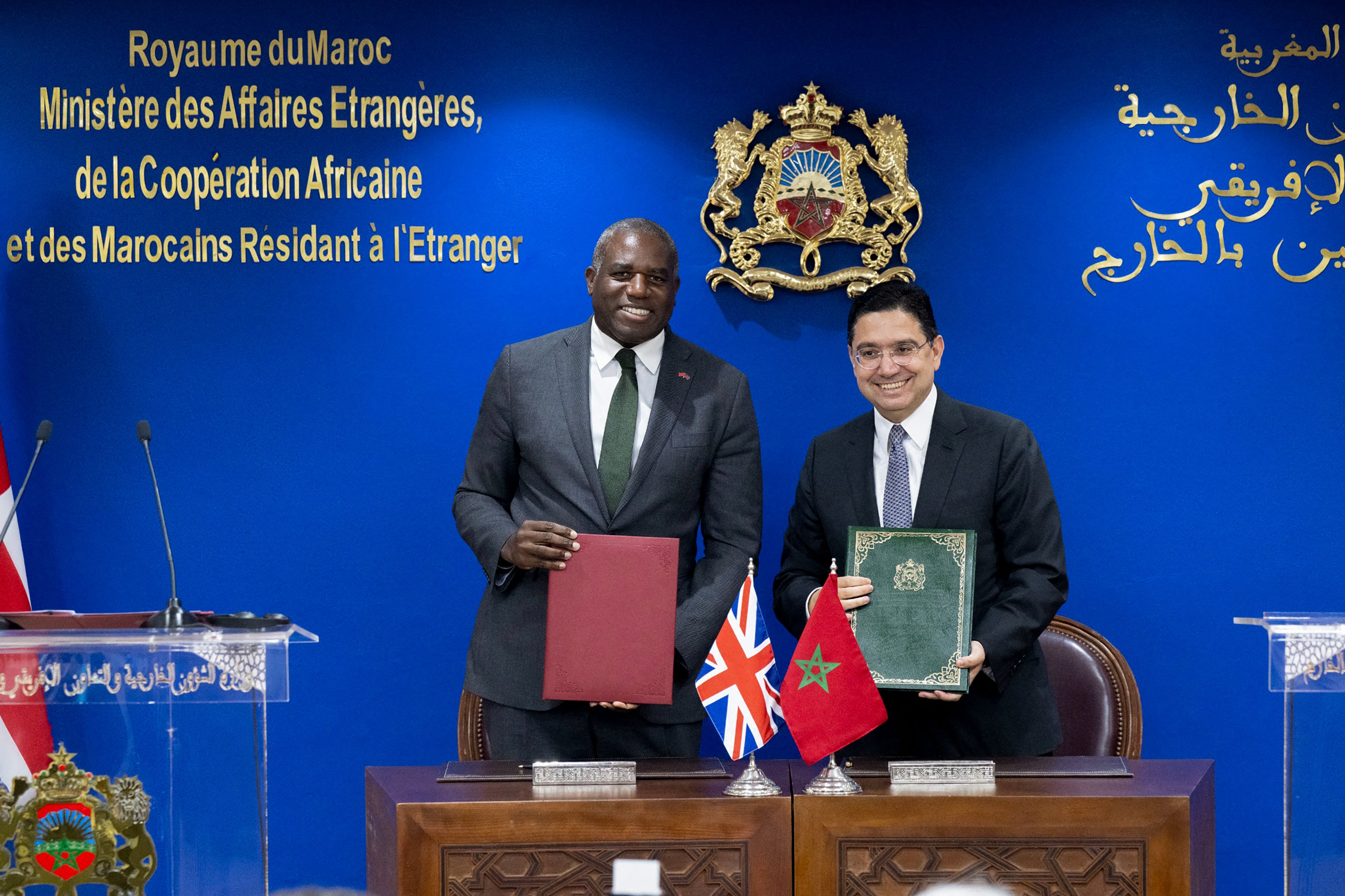 Britain’s foreign secretary David Lammy and his Moroccan counterpart Nasser Bourita sign agreements in Rabat on Monday