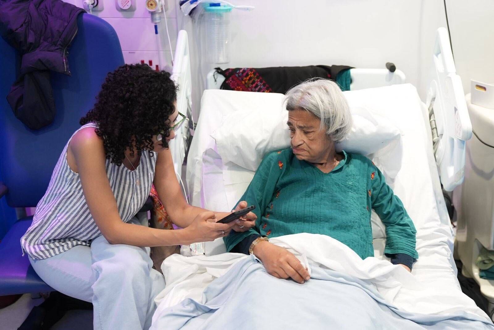 Sanaa Seif, 31, sits with her mother Laila Soueif, 69, in St Thomas Hospital