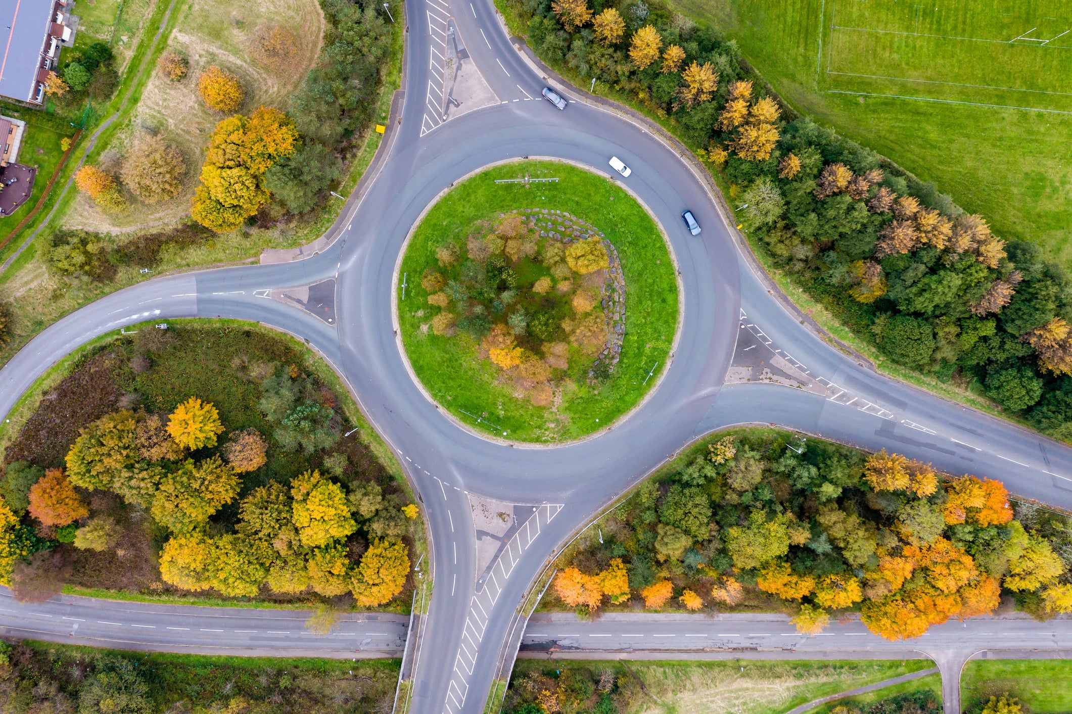 Pictured is a roundabout, likely to be alien to most American drivers