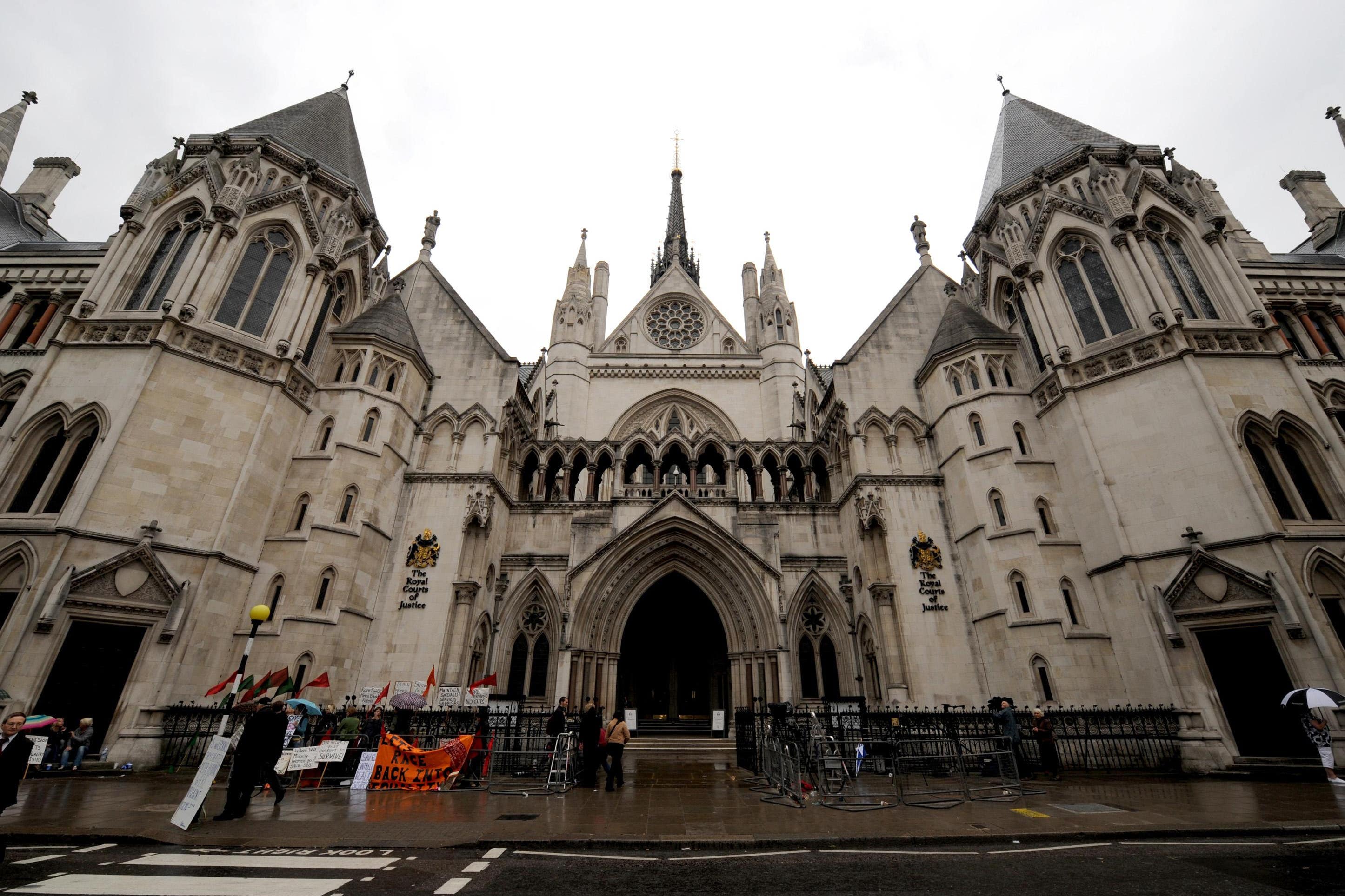 Proceedings were launched at the High Court in London (Anthony Devline/PA)