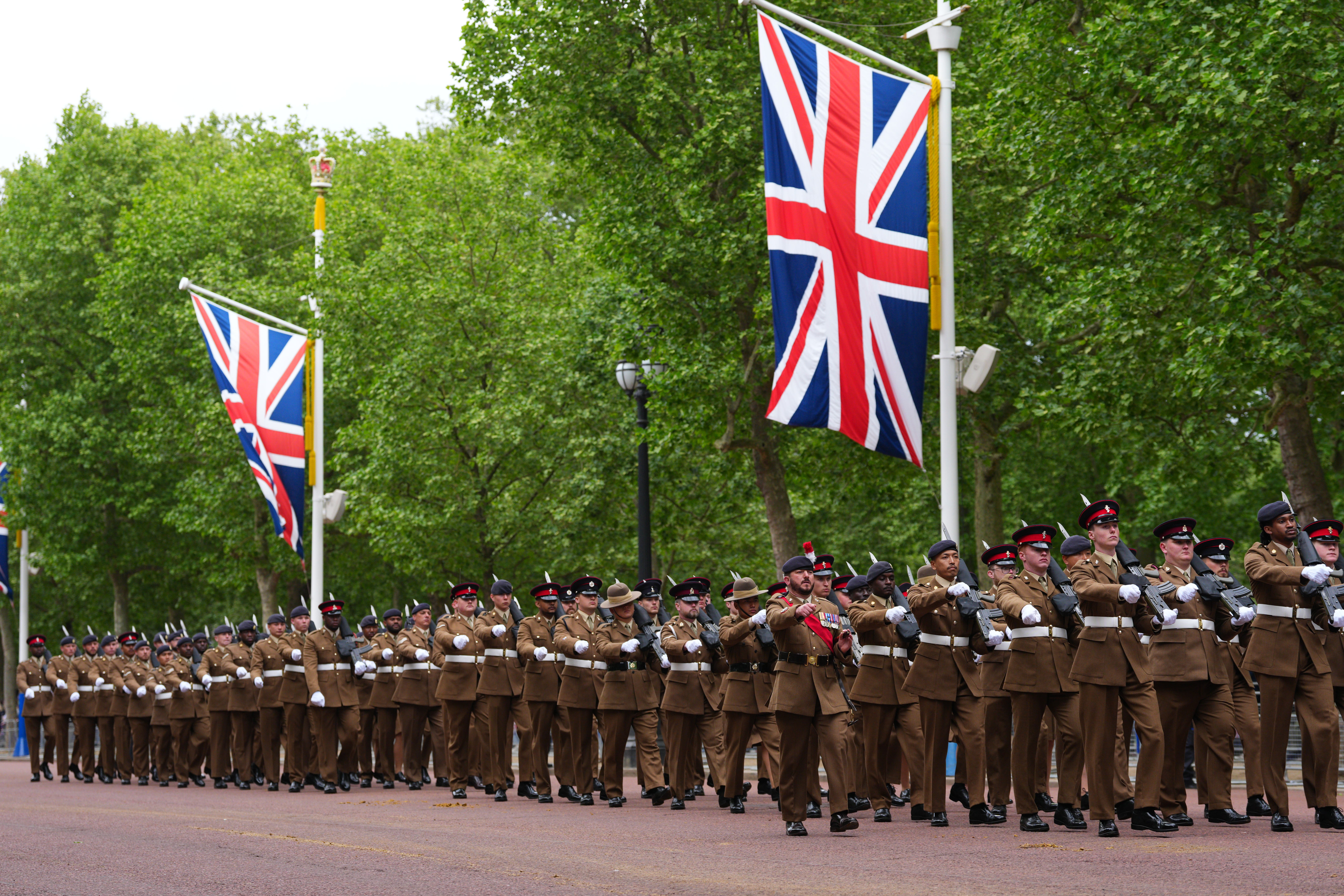 Members of the British armed forces parade on The Mall during a military procession to mark the 80th anniversary of VE Day (Carl Court/PA)