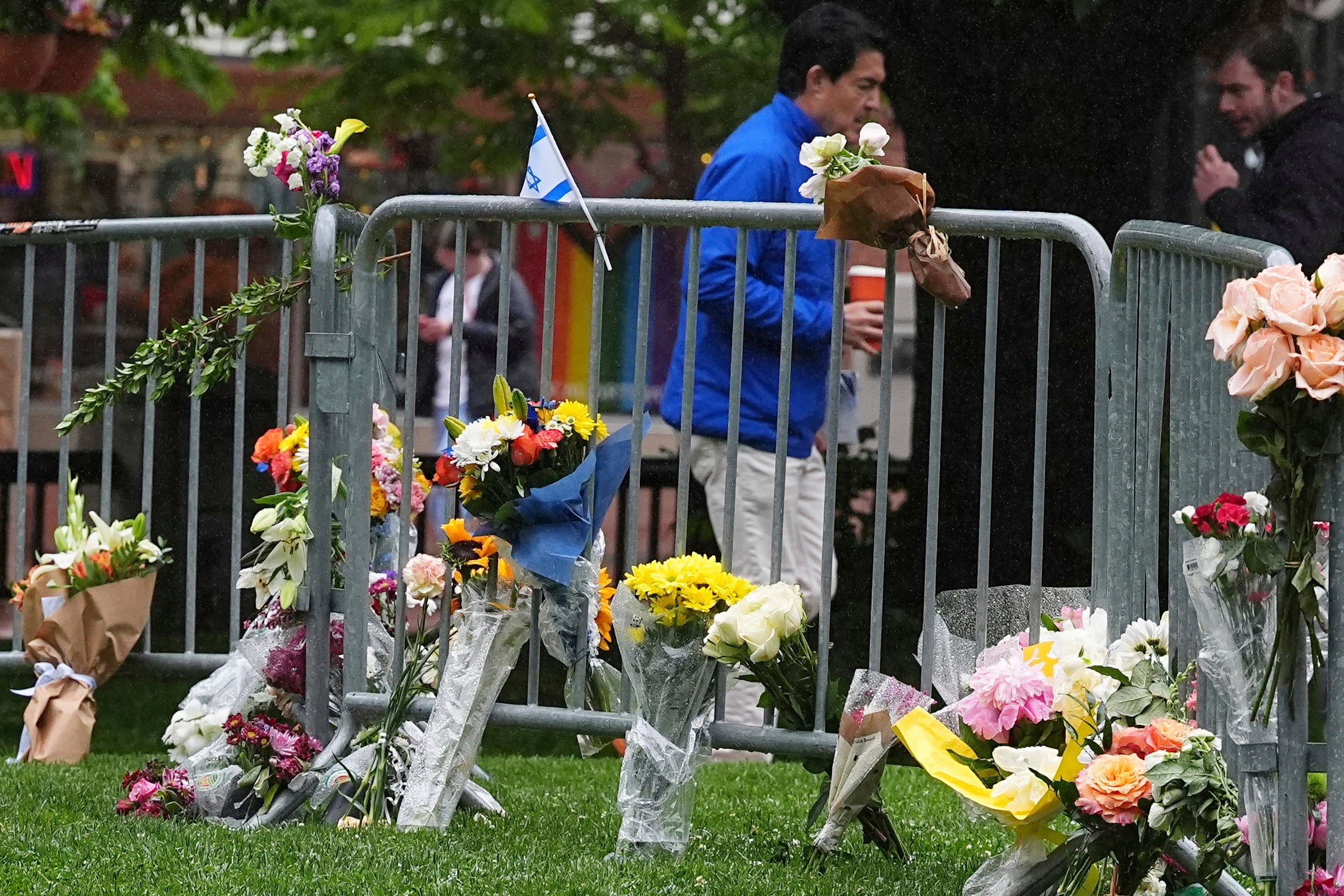 Wellwishers leave flowers at the scene of the attack in Boulder, Colorado