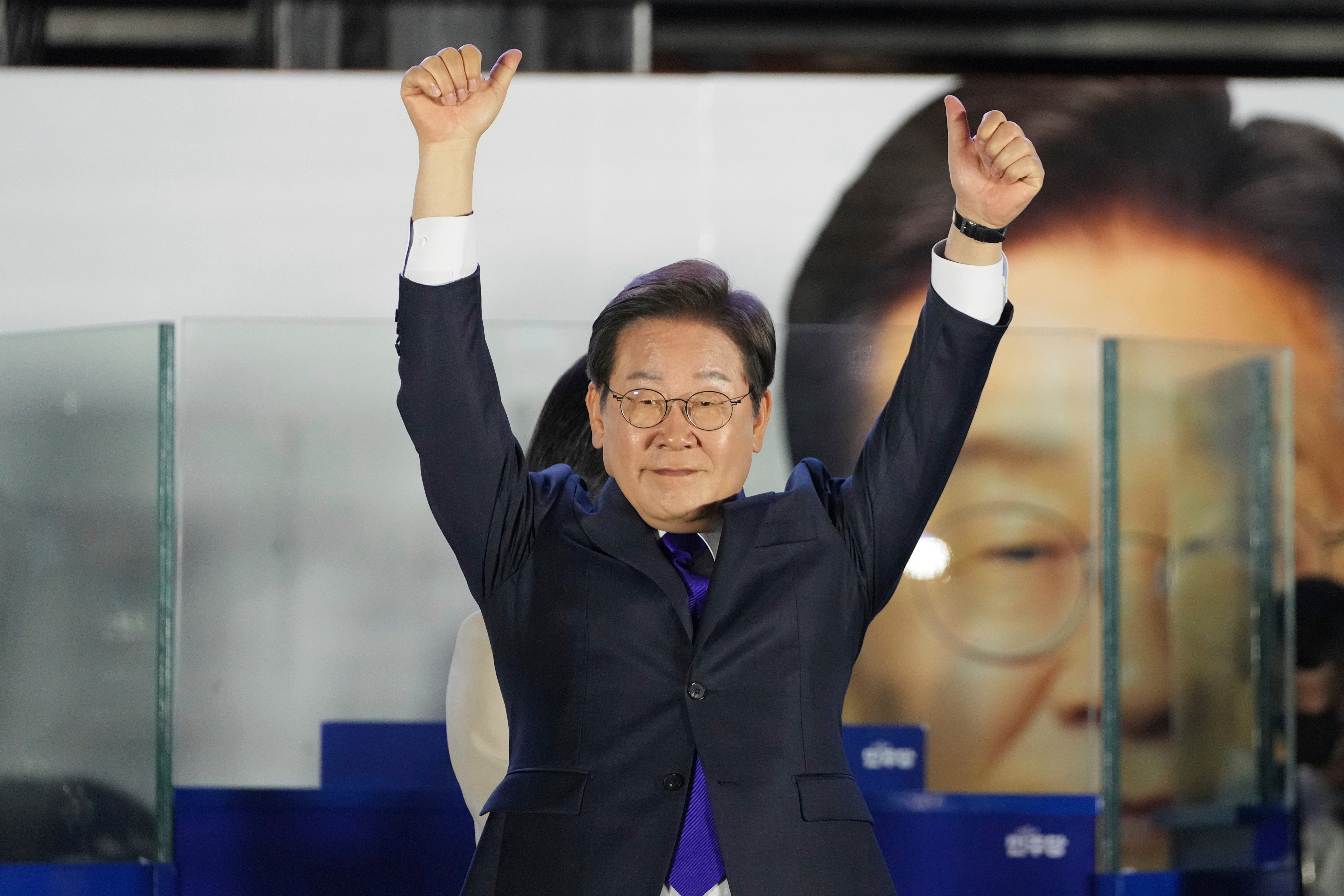South Korea's Democratic Party's Lee Jae Myung, gestures as his supporters gather outside of the National Assembly in Seoul