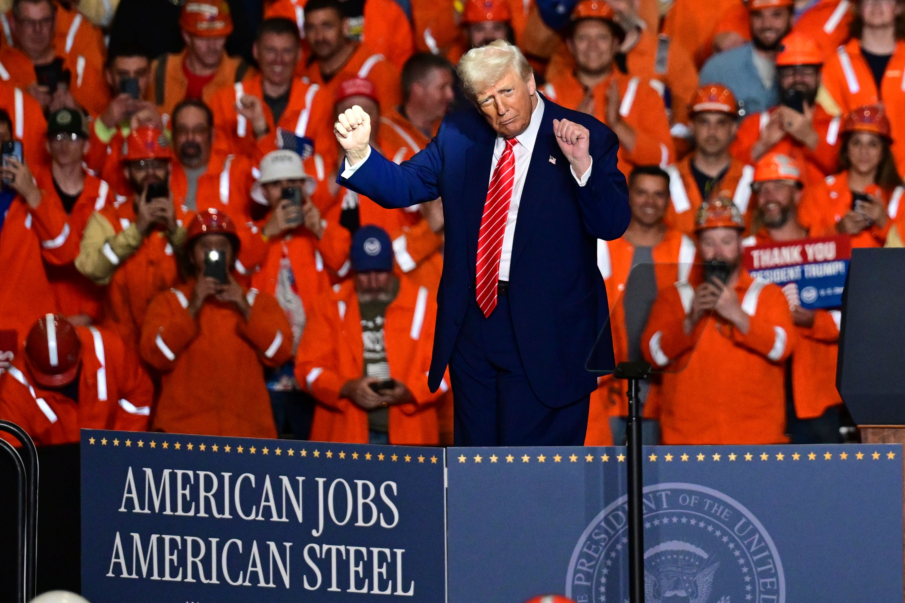 Donald Trump exempted the UK from a 50% tariff on steel imports, keeping the levy at 25% until a trade deal agreed between the two countries is implemented (David Dermer/AP)