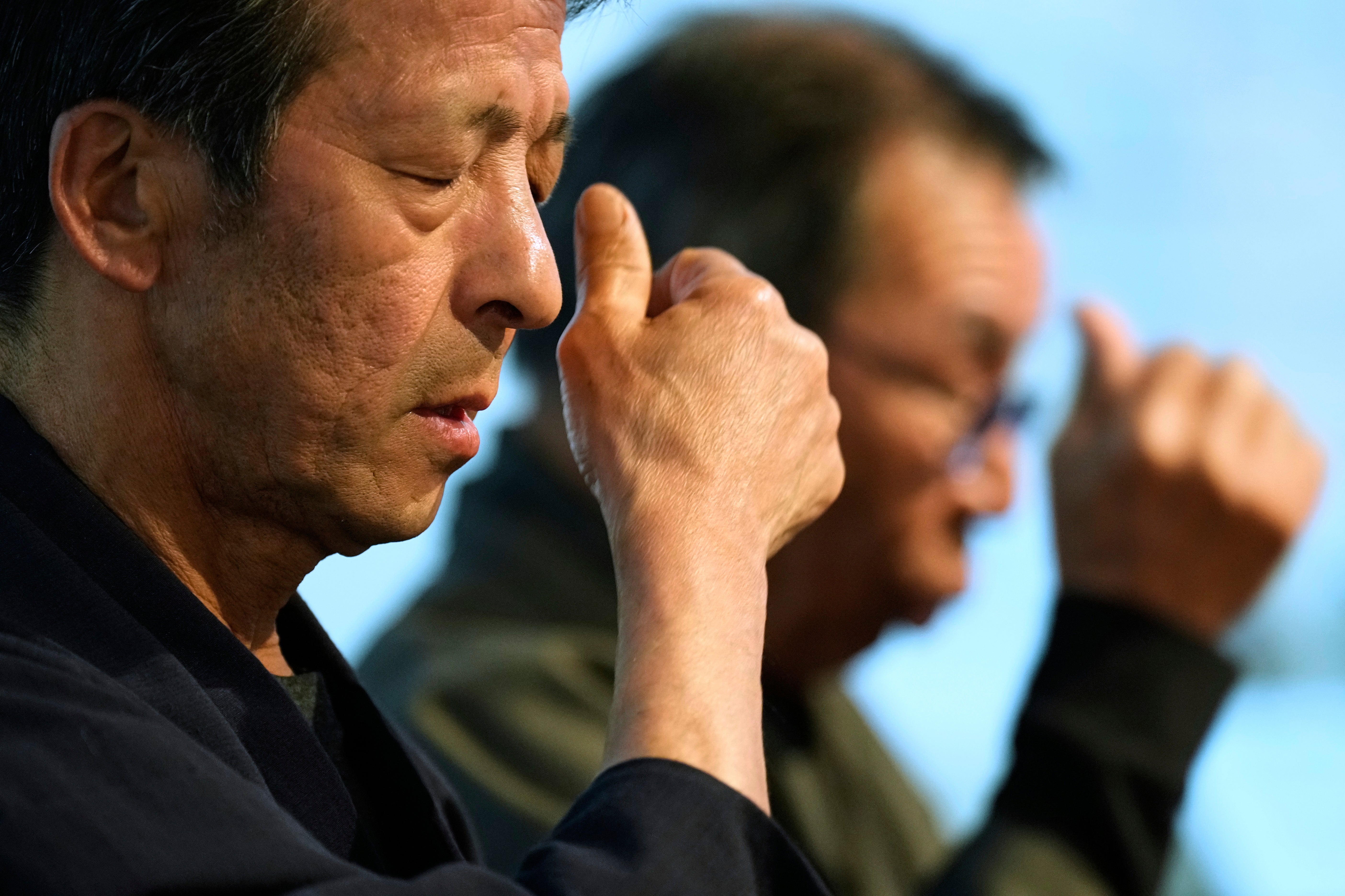 Masatsugu Tanimoto, left, and Yoshitaka Oishi in the Ikitsuki Island Museum "Shima no Yakata"