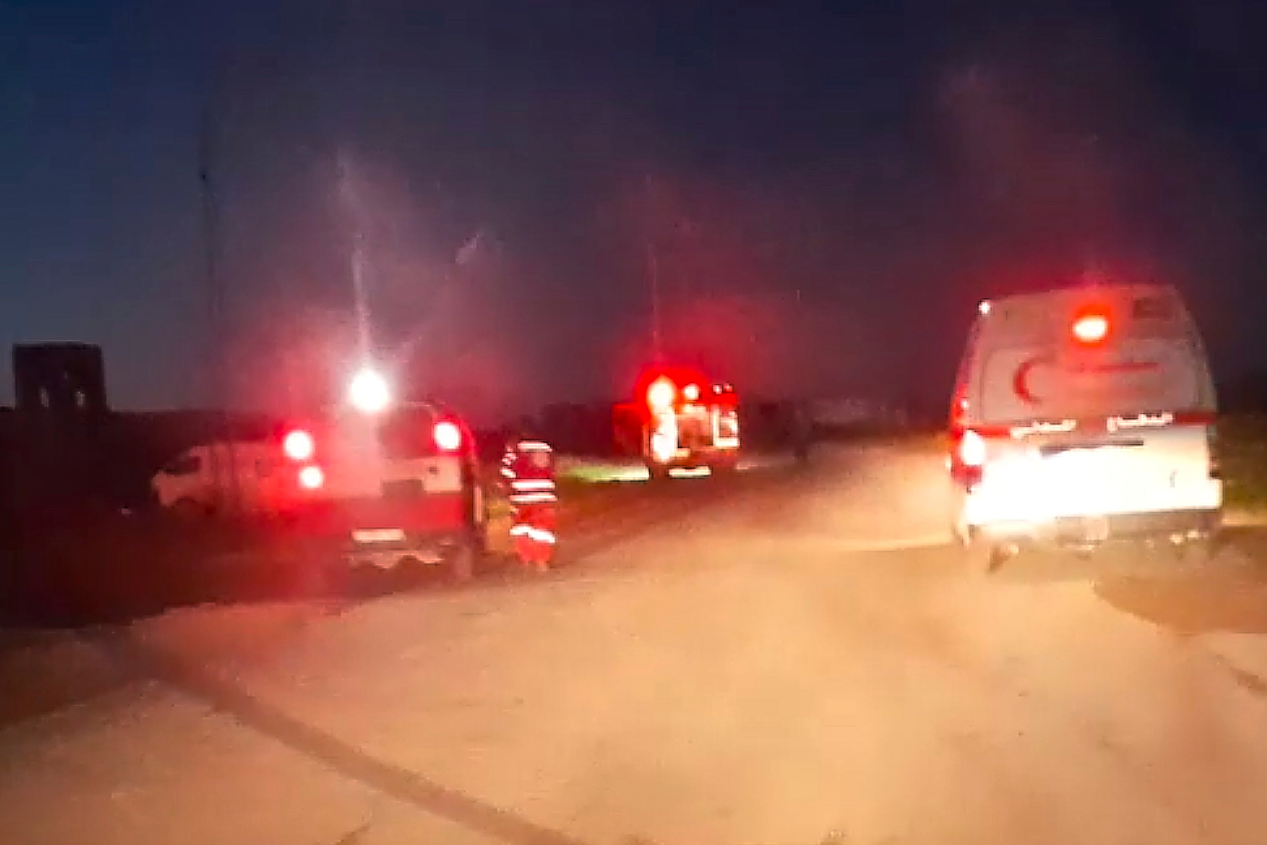 Red Crescent emergency vehicles, their lights and sirens flashing and their logos clearly visible, seconds before they came under a barrage of gunfire from Israeli army soldiers in Tel al-Sultan