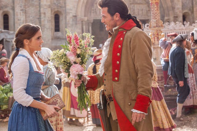<p>Emma Watson as Belle and Luke Evans as Gaston in Beauty And The Beast </p>