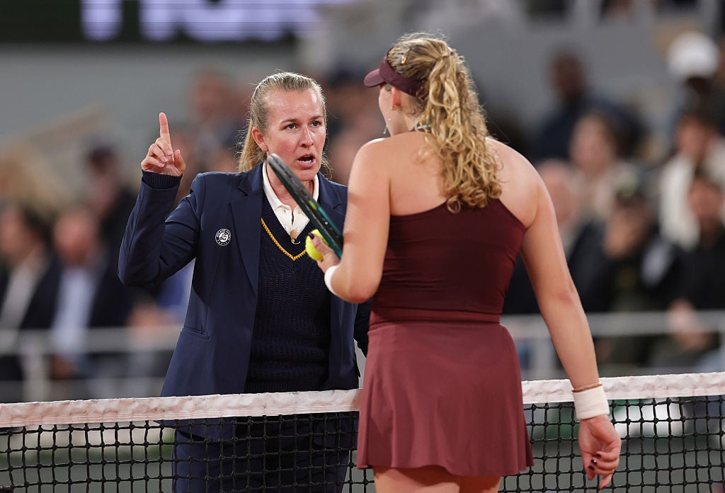 Chair umpire Miriam Bley issues a warning to Mirra Andreeva