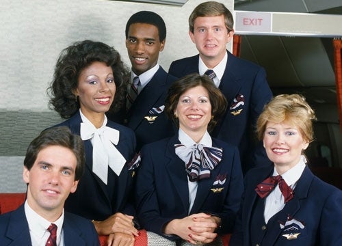 Tailor Robert Taylor-Southall describes the flight attendants in this image as having a 'quintessentially 80s' look